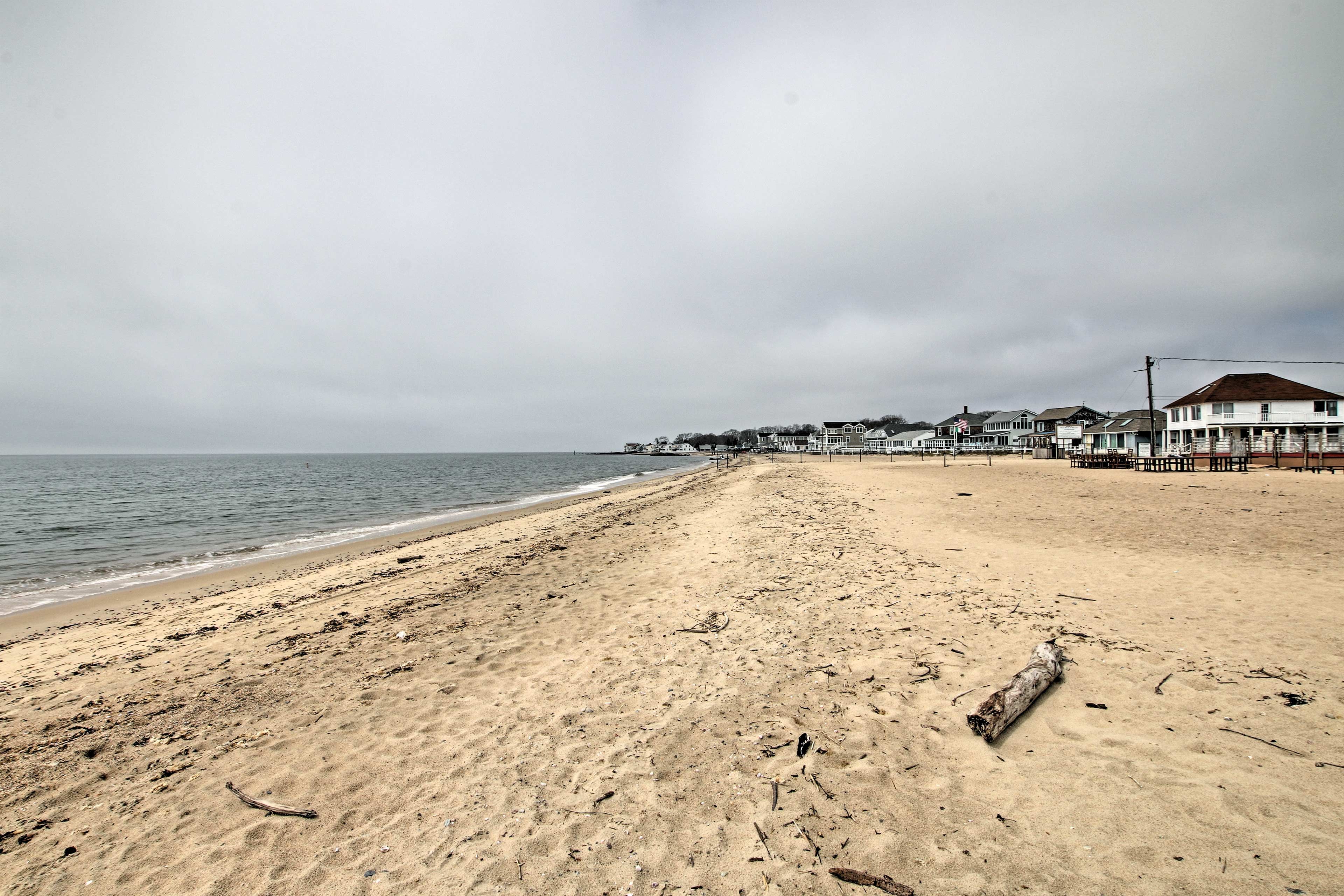 Sink your toes into the soft sand as you stroll along the water!