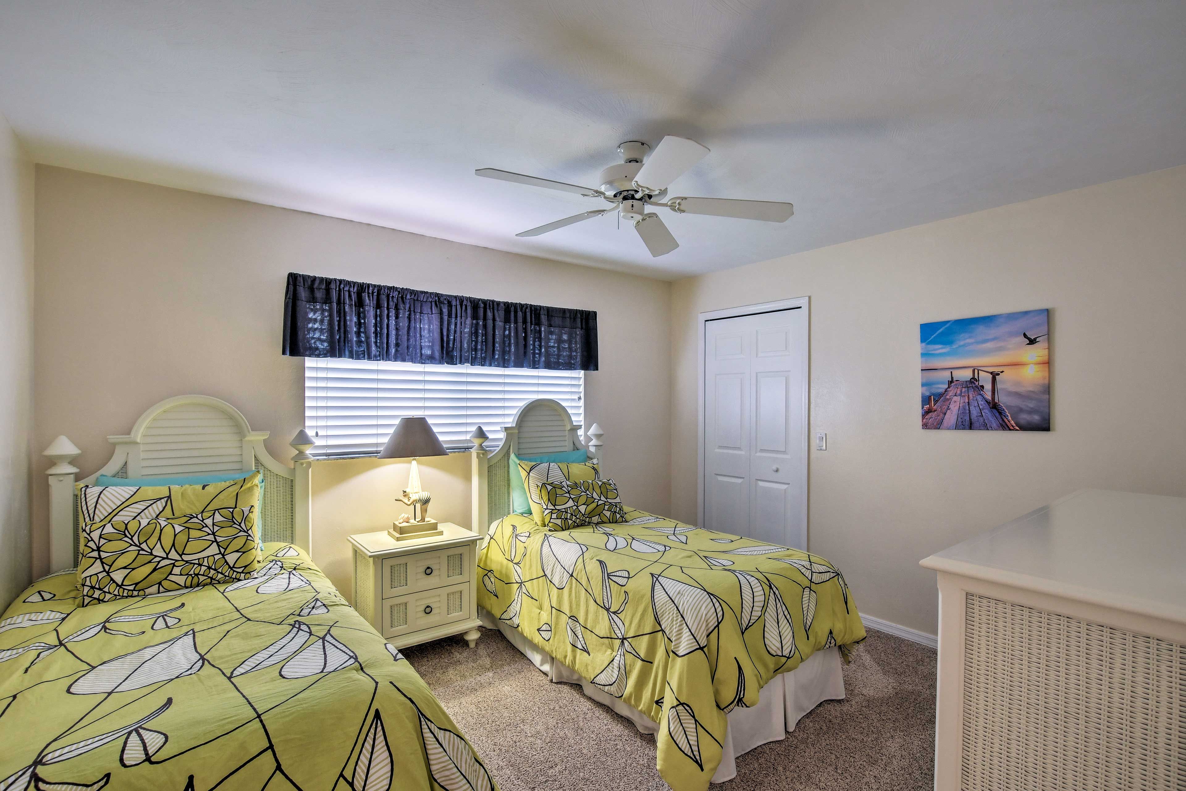 You don’t have to be twins to sleep in this cozy room with 2 twin-sized beds.