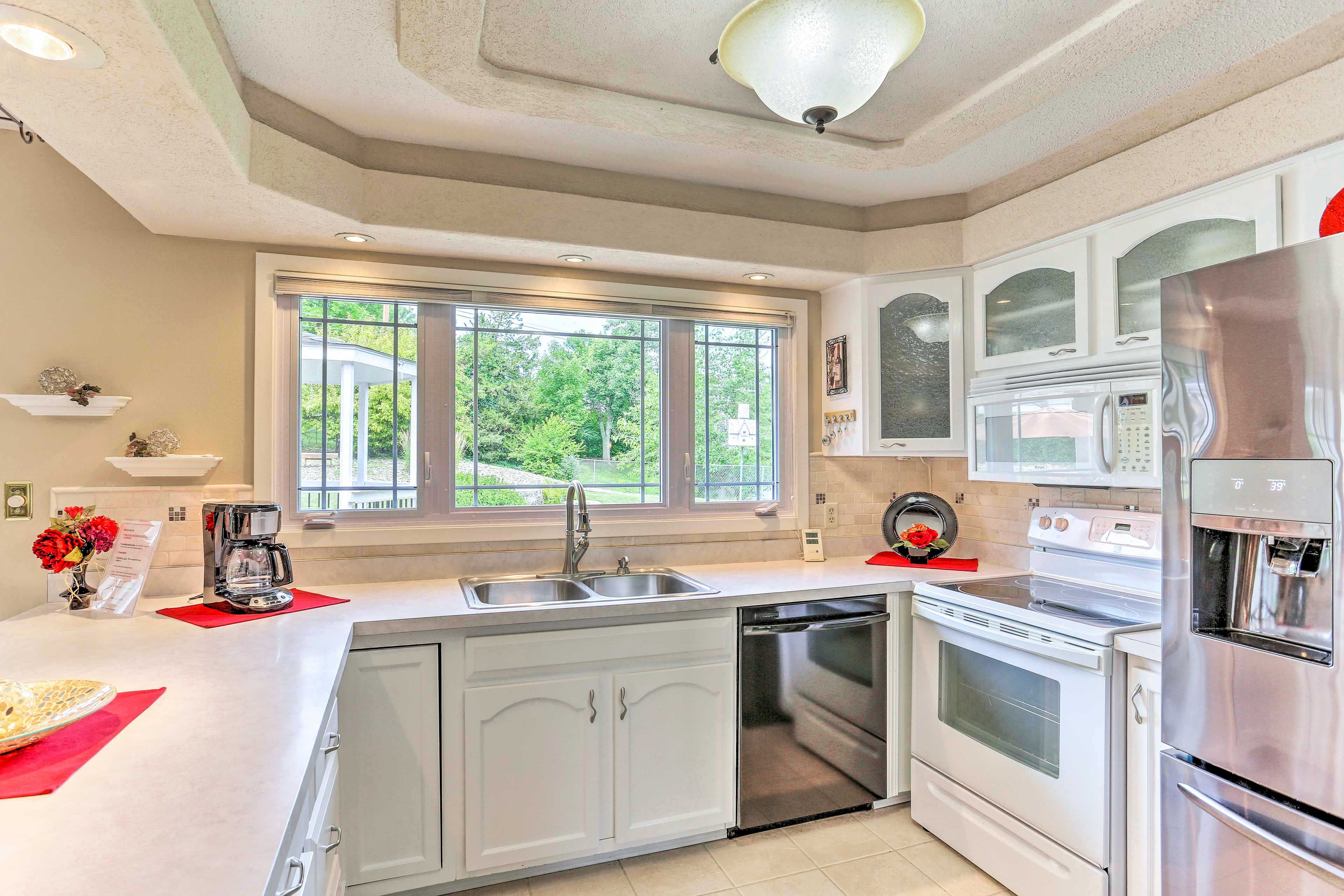 The full kitchen features high-end appliances.