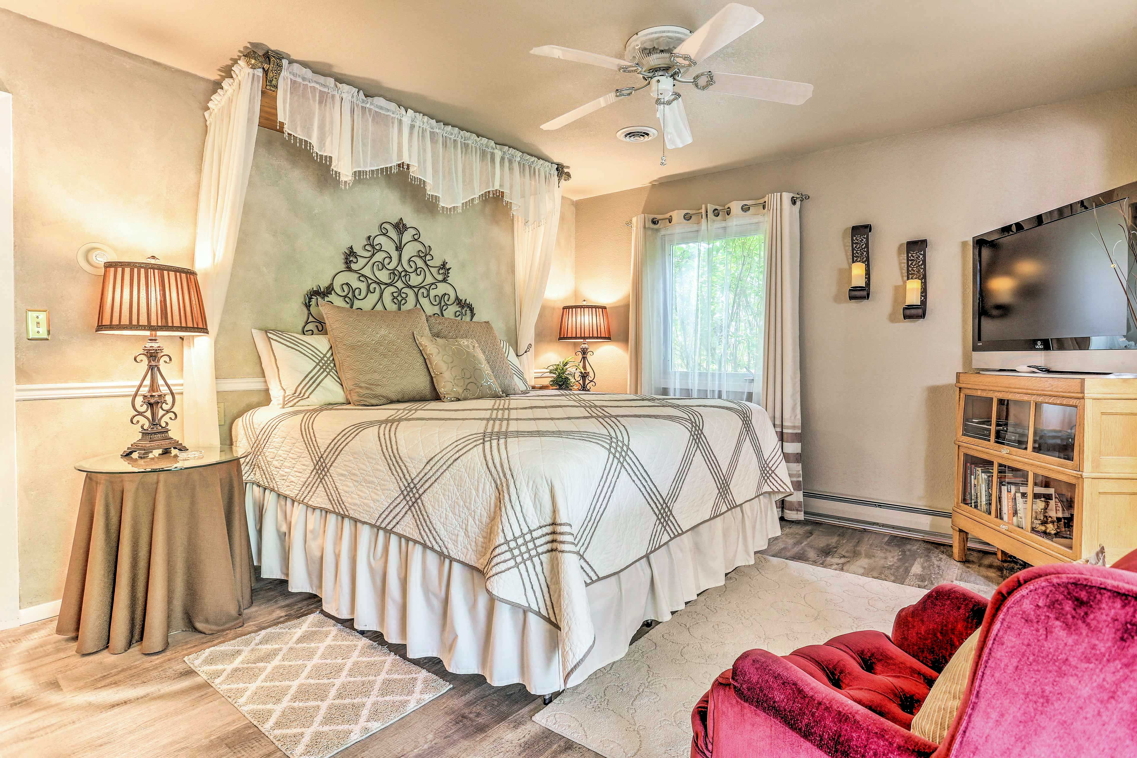 This primary bedroom is fit for a king.