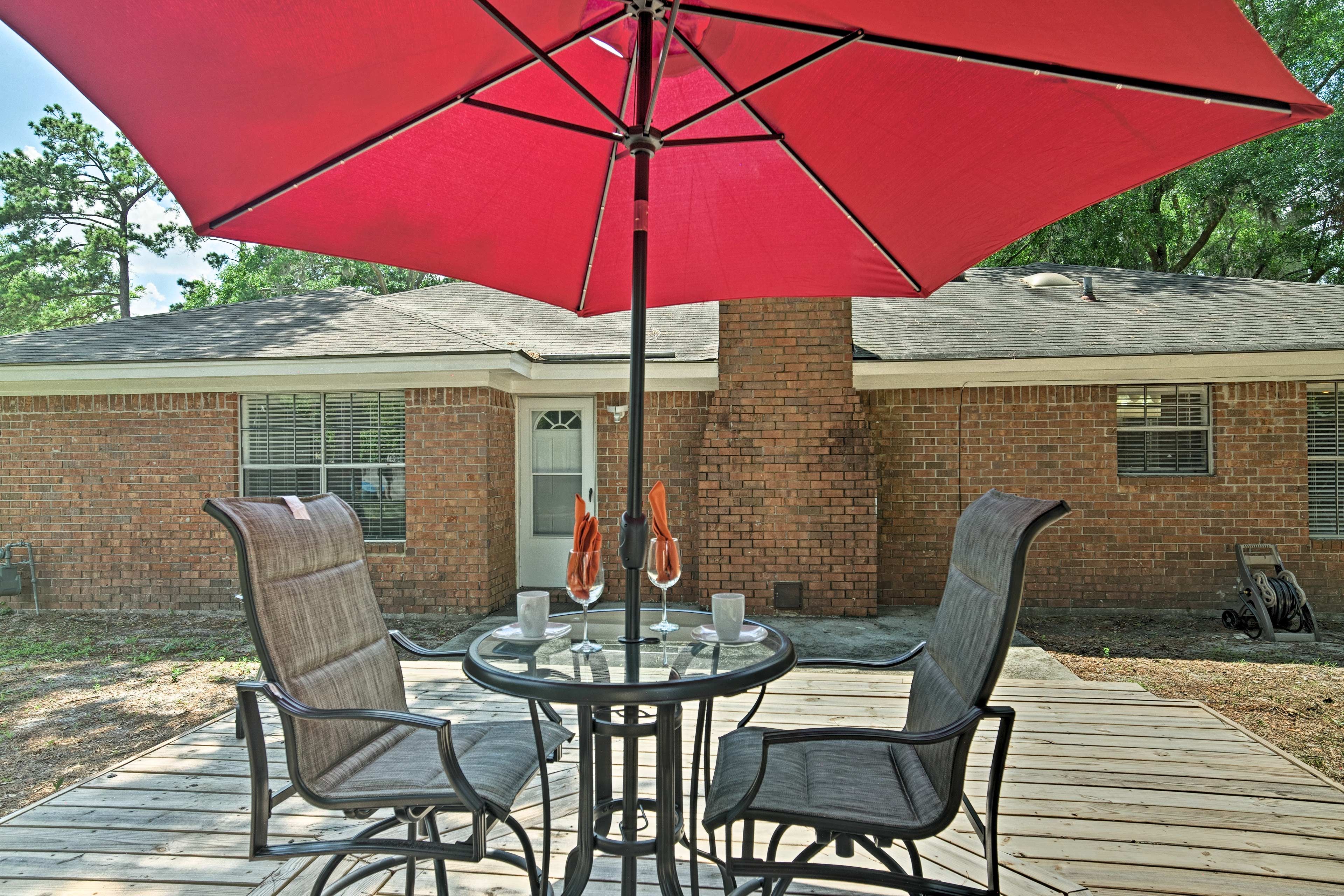 Enjoy your morning coffee or an afternoon cocktail on the back deck.
