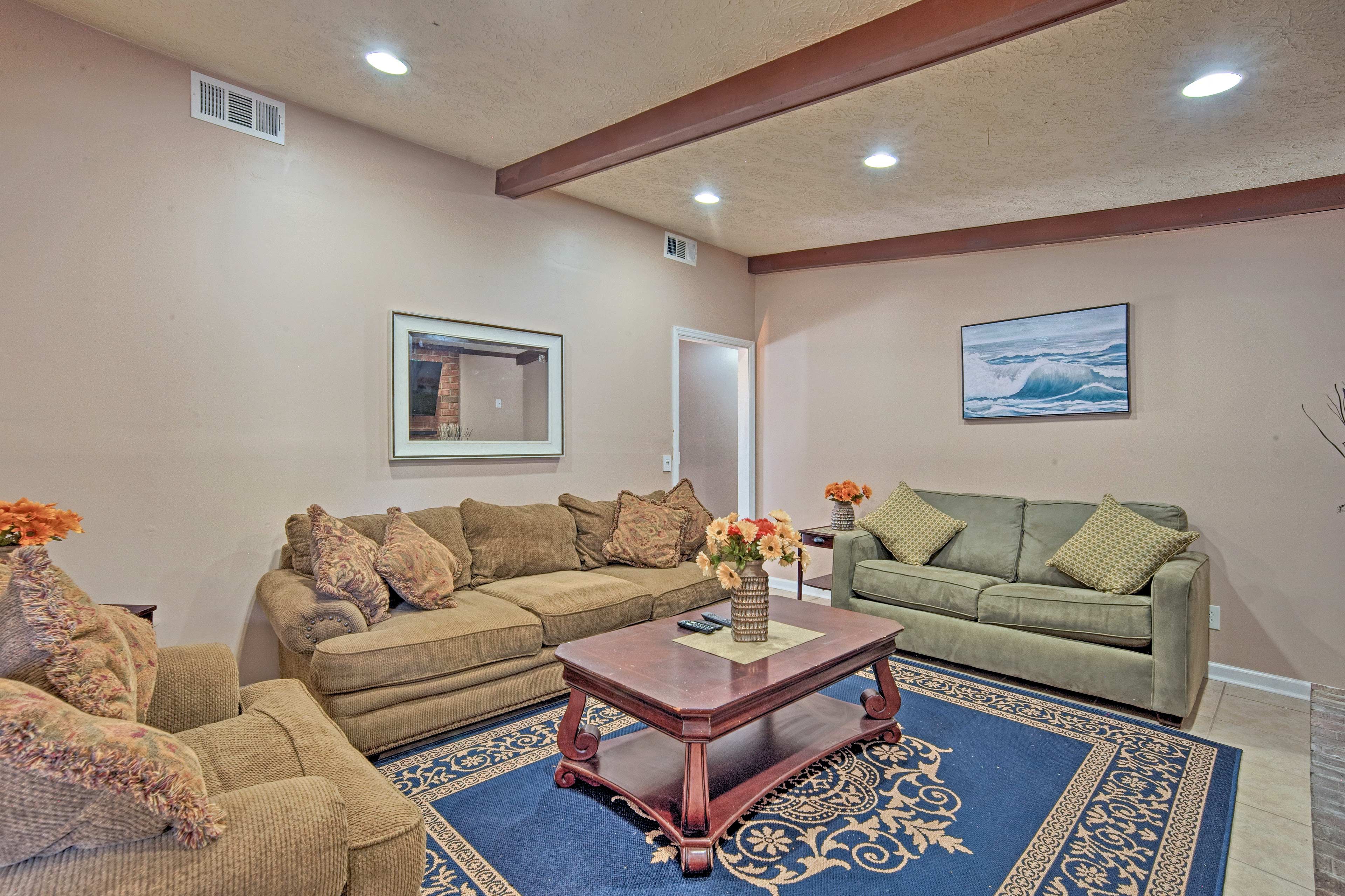 Watch TV while the wood-burning fireplace warms the room.