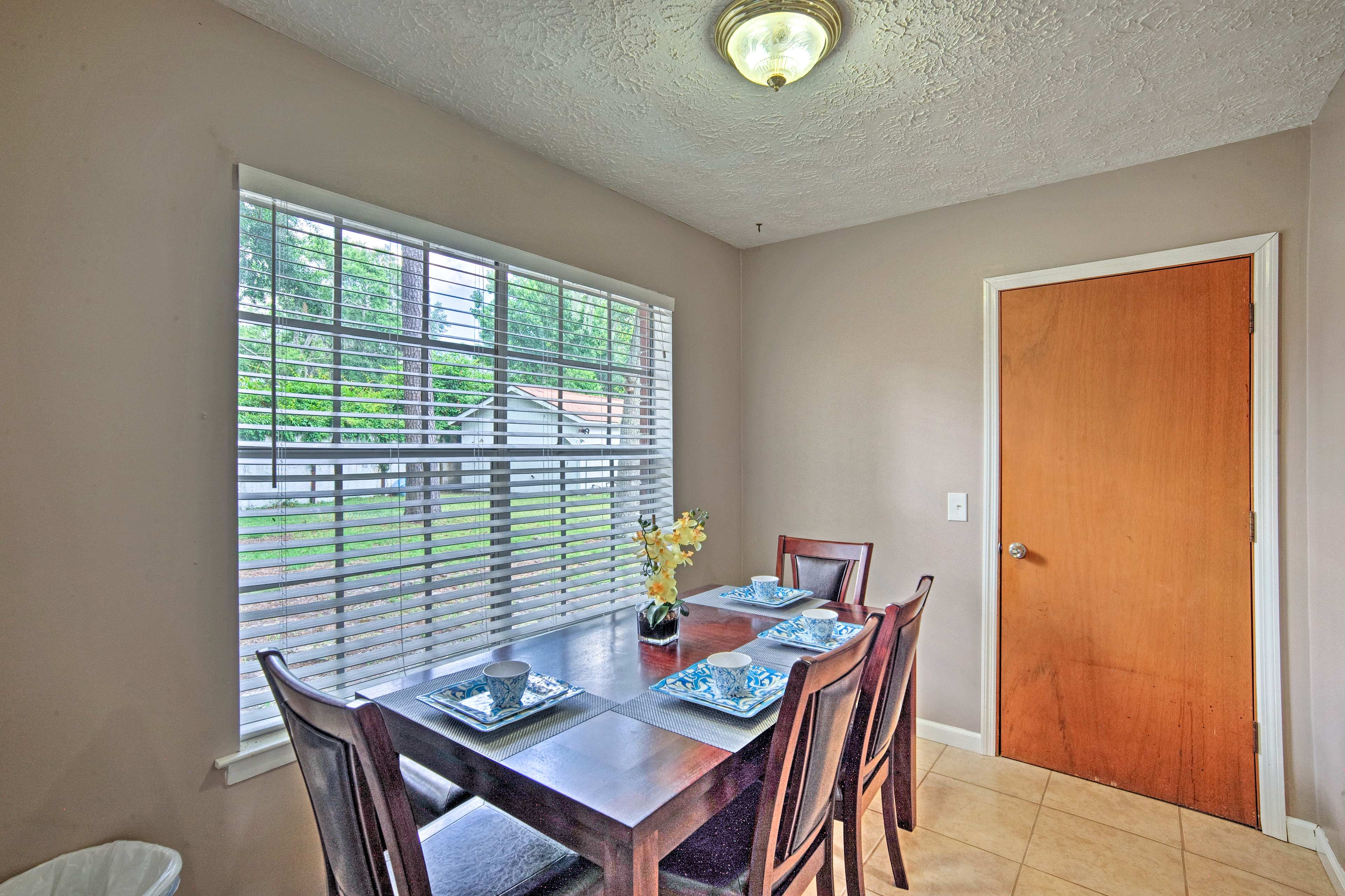 Enjoy family meals at the wooden dining table.