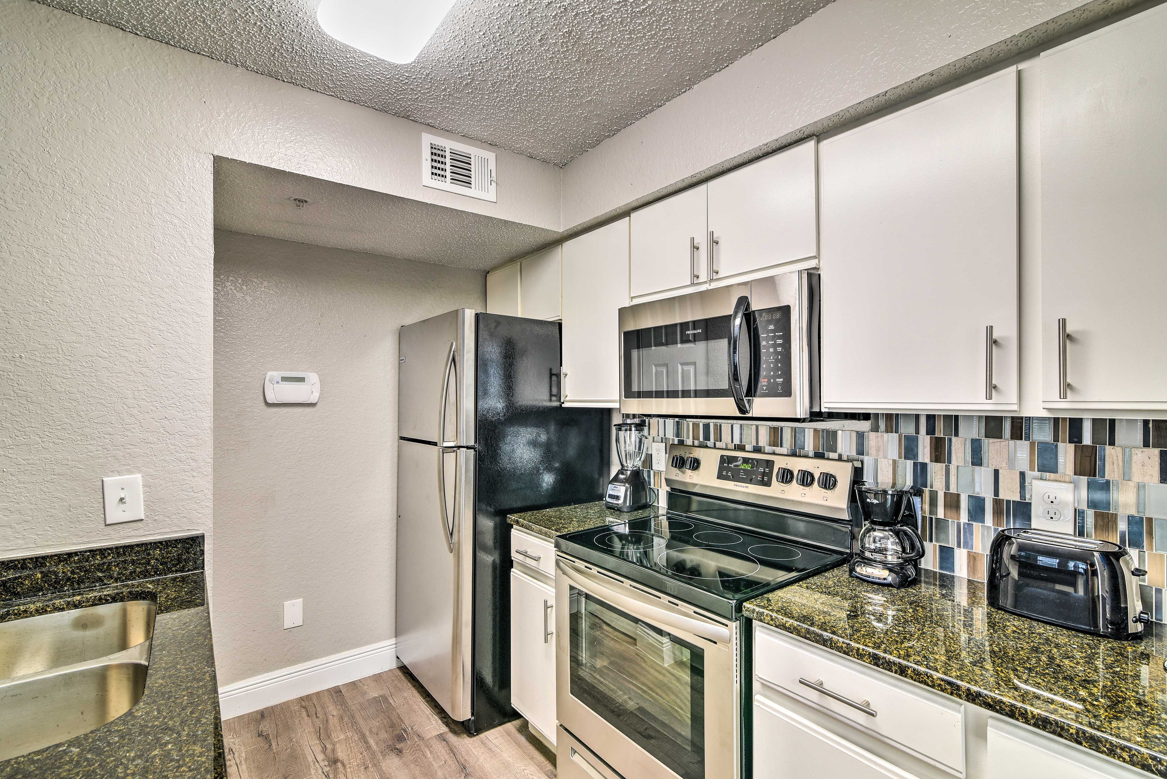 This stylish kitchen is fully equipped.