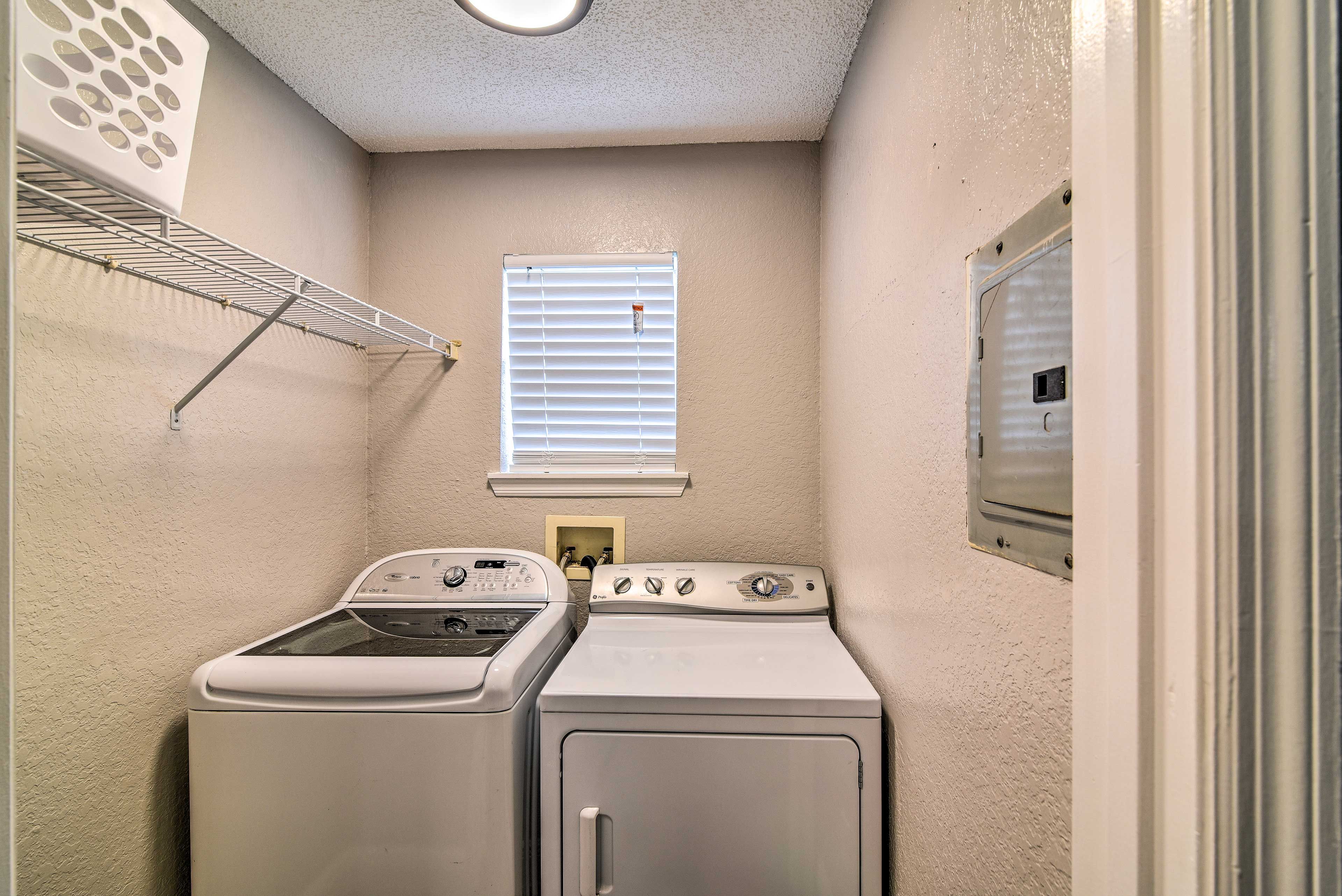 A washer and dryer are conveniently located inside the unit.