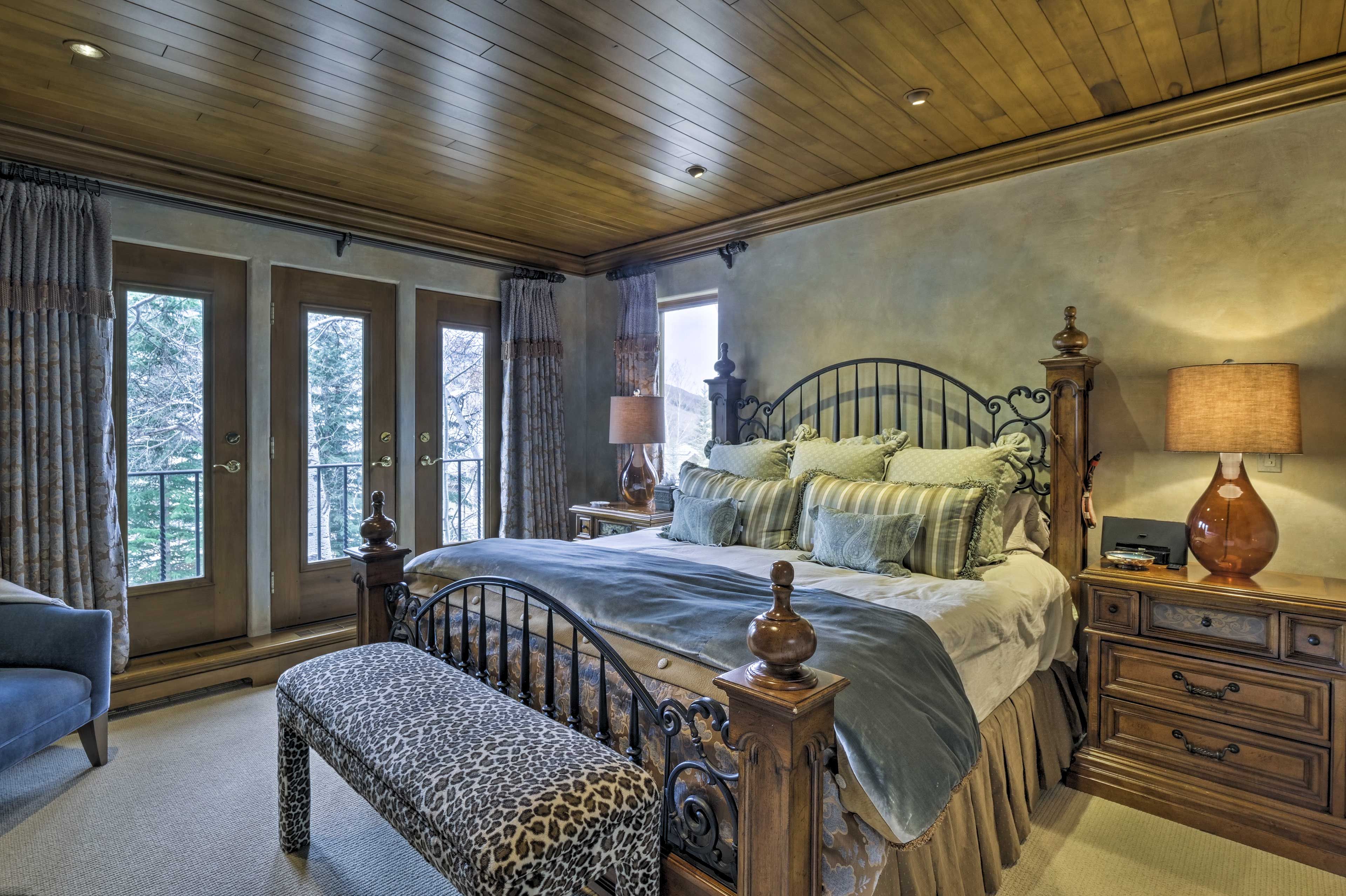 The first master bedroom offers a king bed.