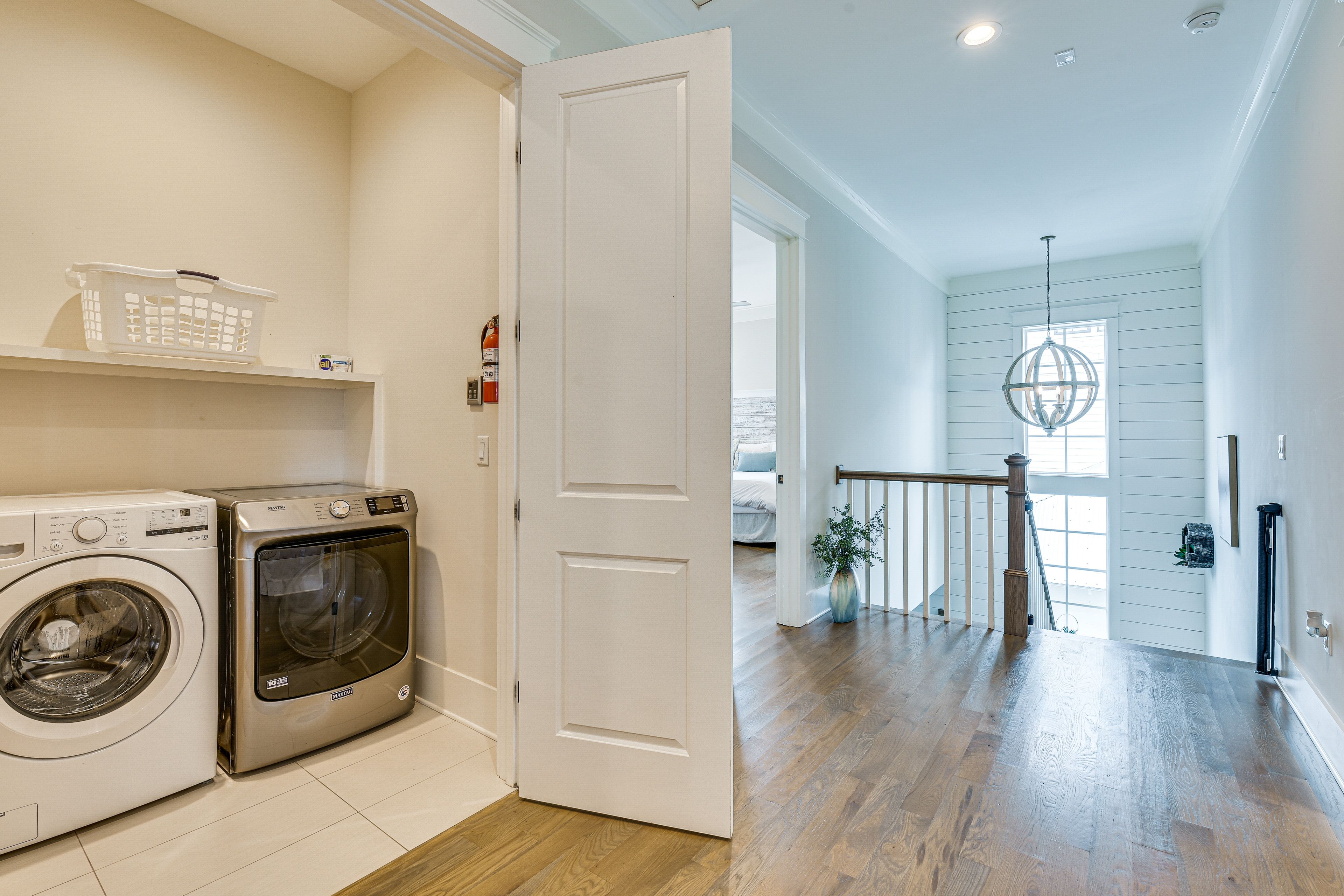 Interior Stairs to Addt'l Bedrooms | Laundry Closet