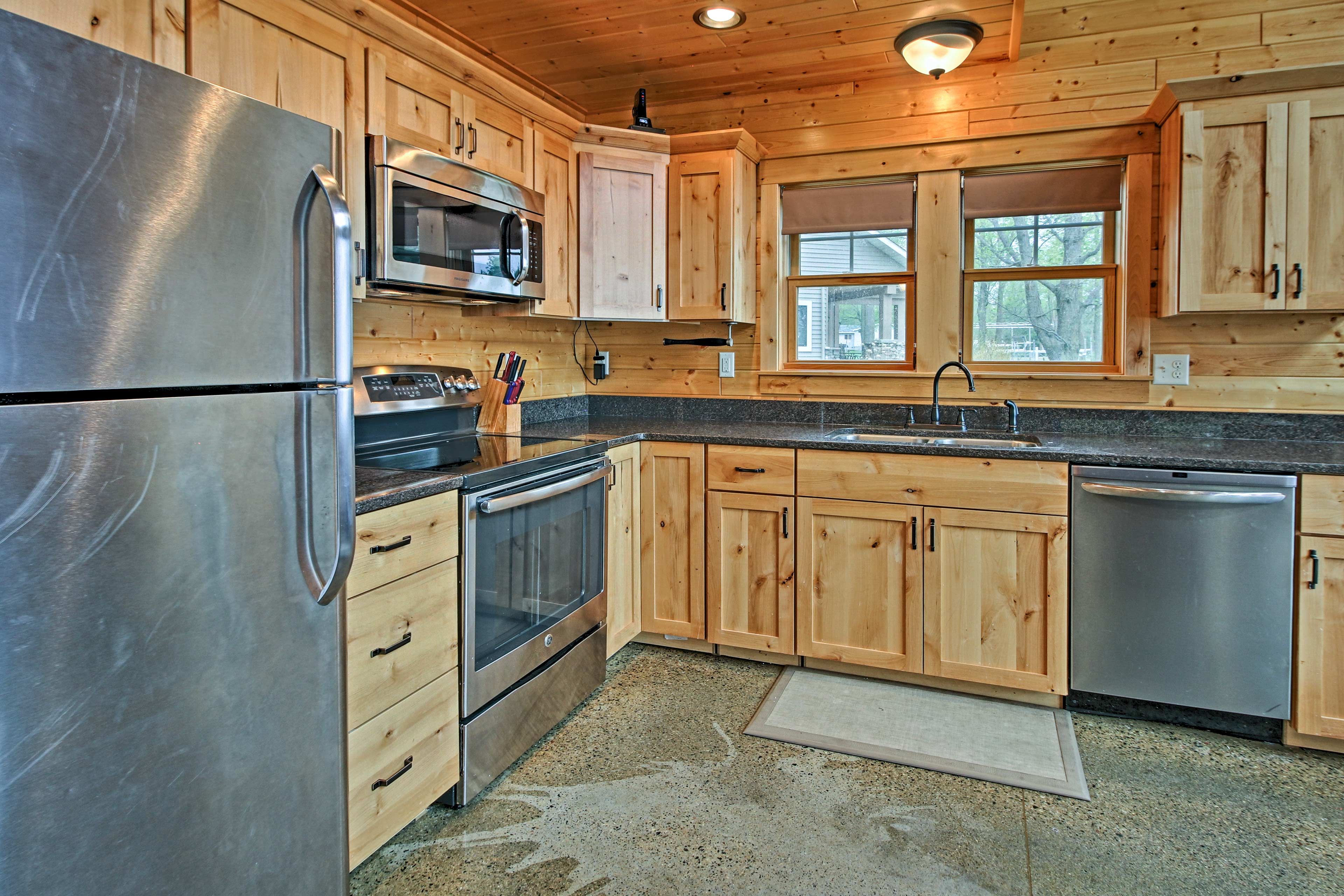 The living room opens up to the fully equipped kitchen.