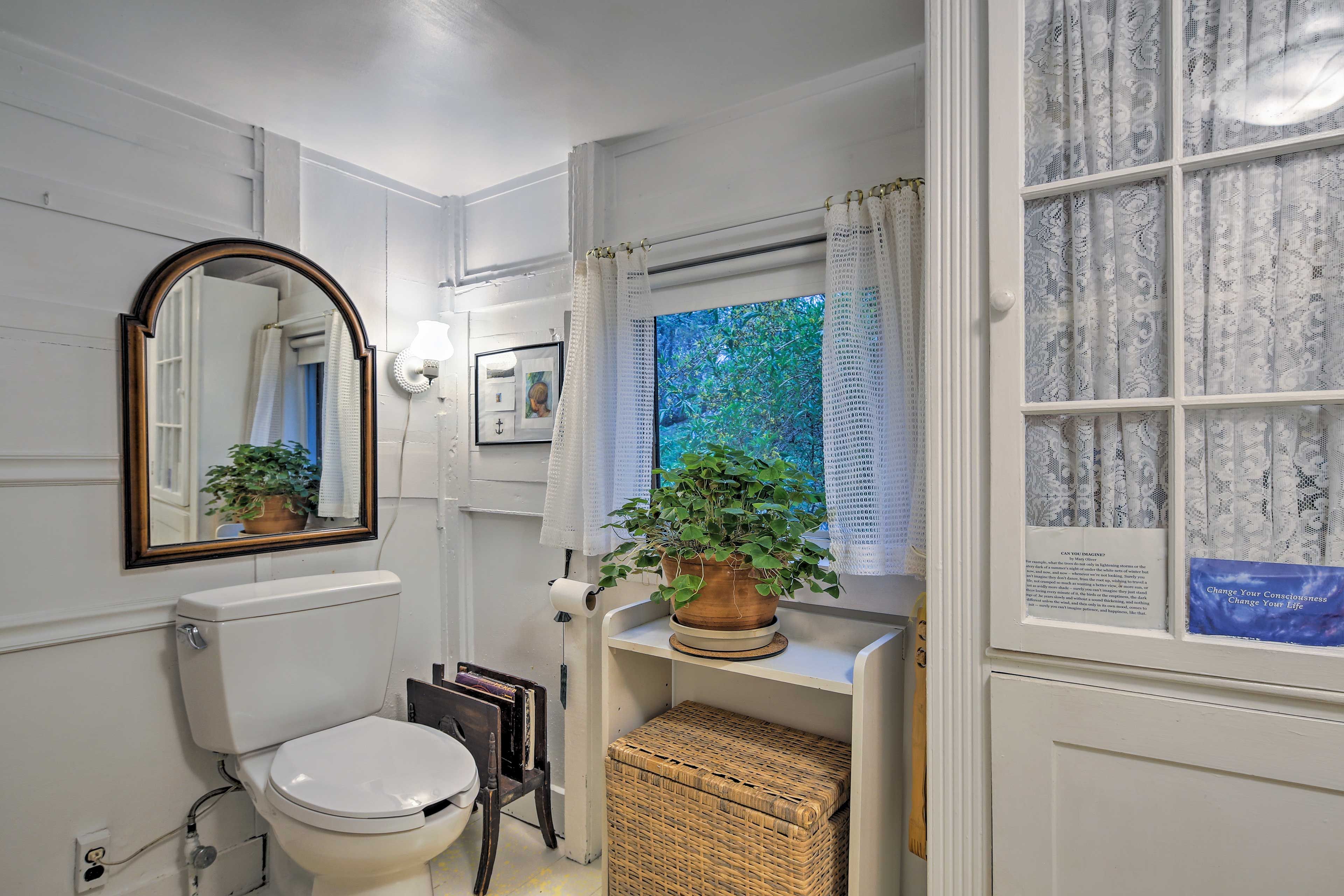 Rinse off the day in this spacious bathroom.