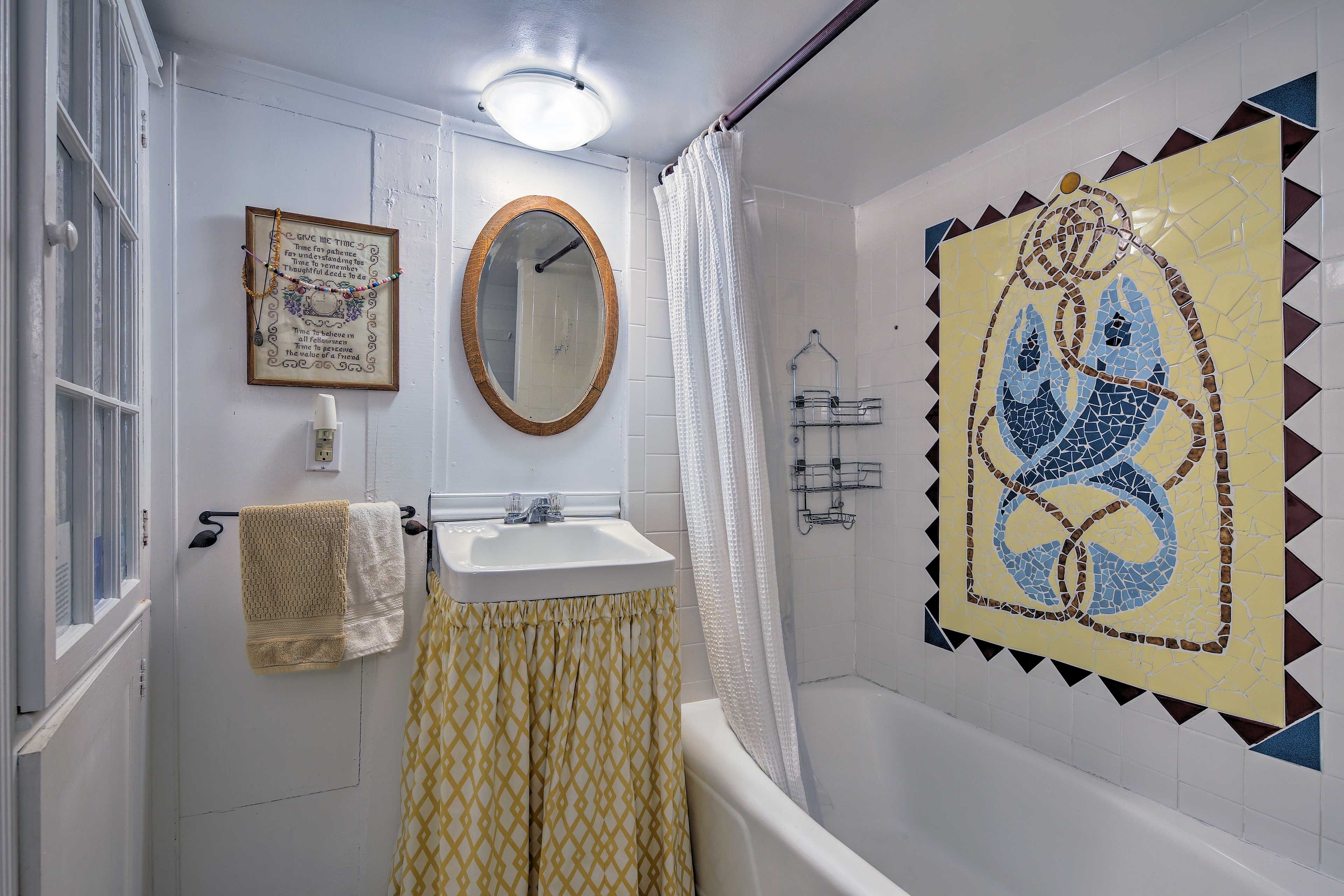 You'll love this bathroom's unique mosaic.