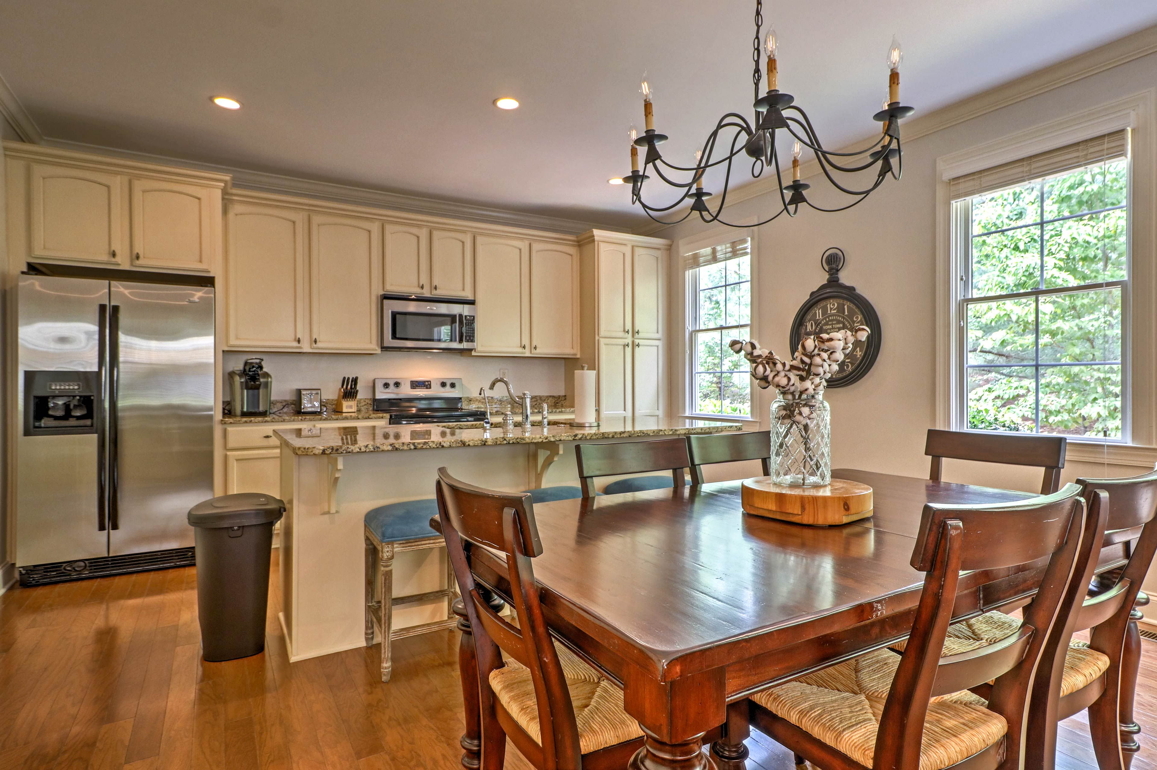 The living room leads to the dining room and kitchen.