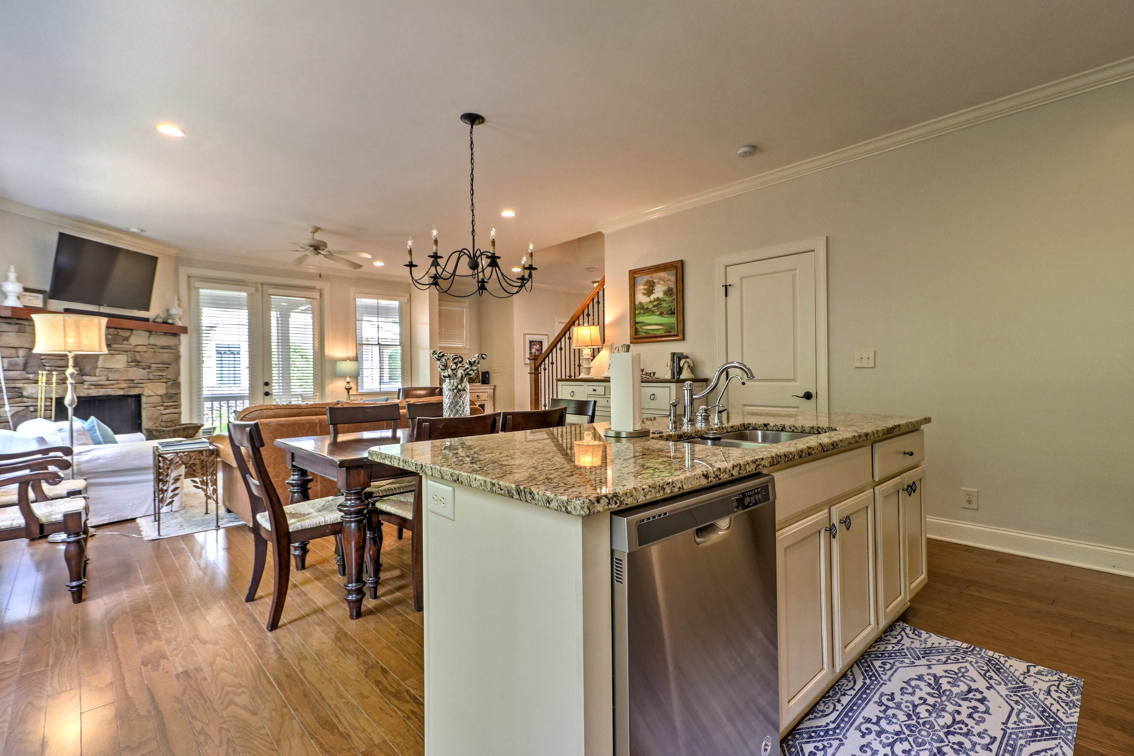 Prepare meals in the fully equipped kitchen which is open to the living room.