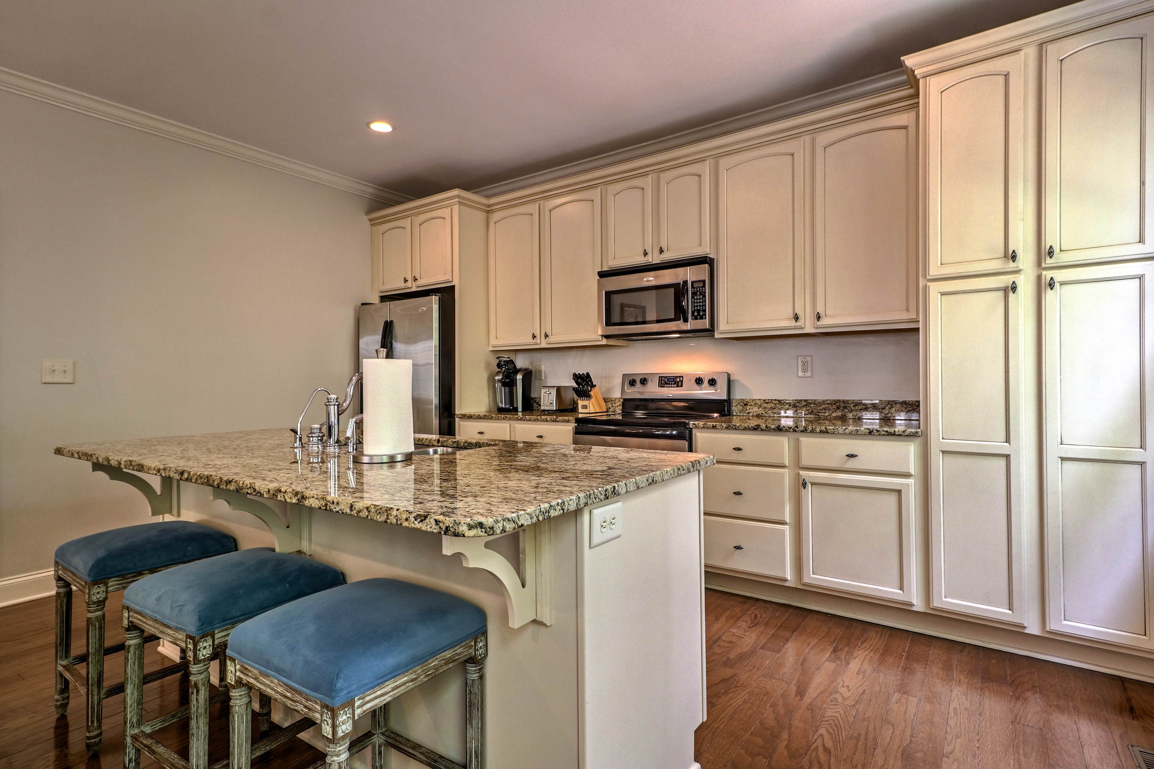 The stainless steel appliances look pretty and make cooking a breeze.