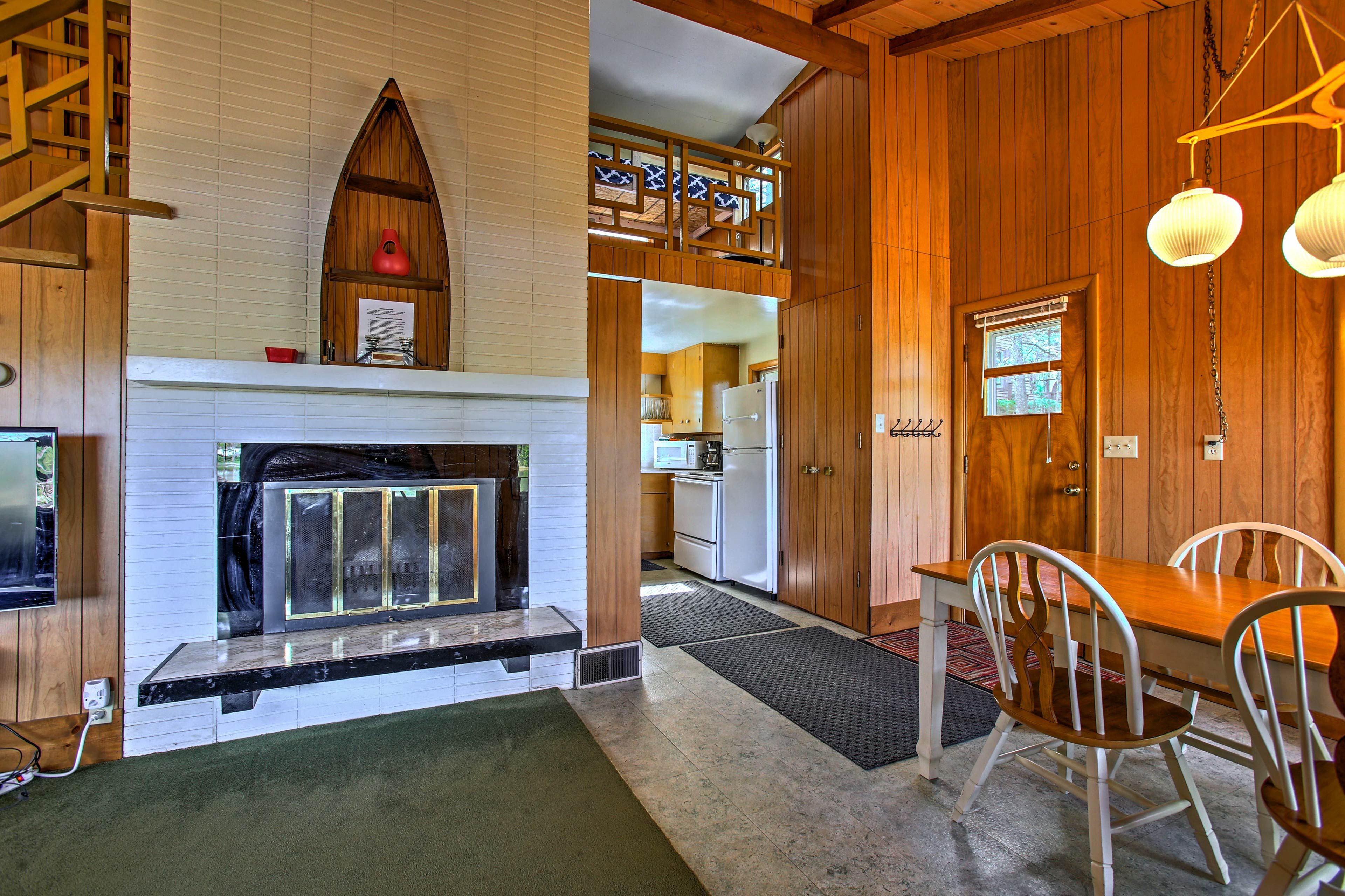 Stock the wood-burning fireplace, setting the mood for a cozy winter's evening.