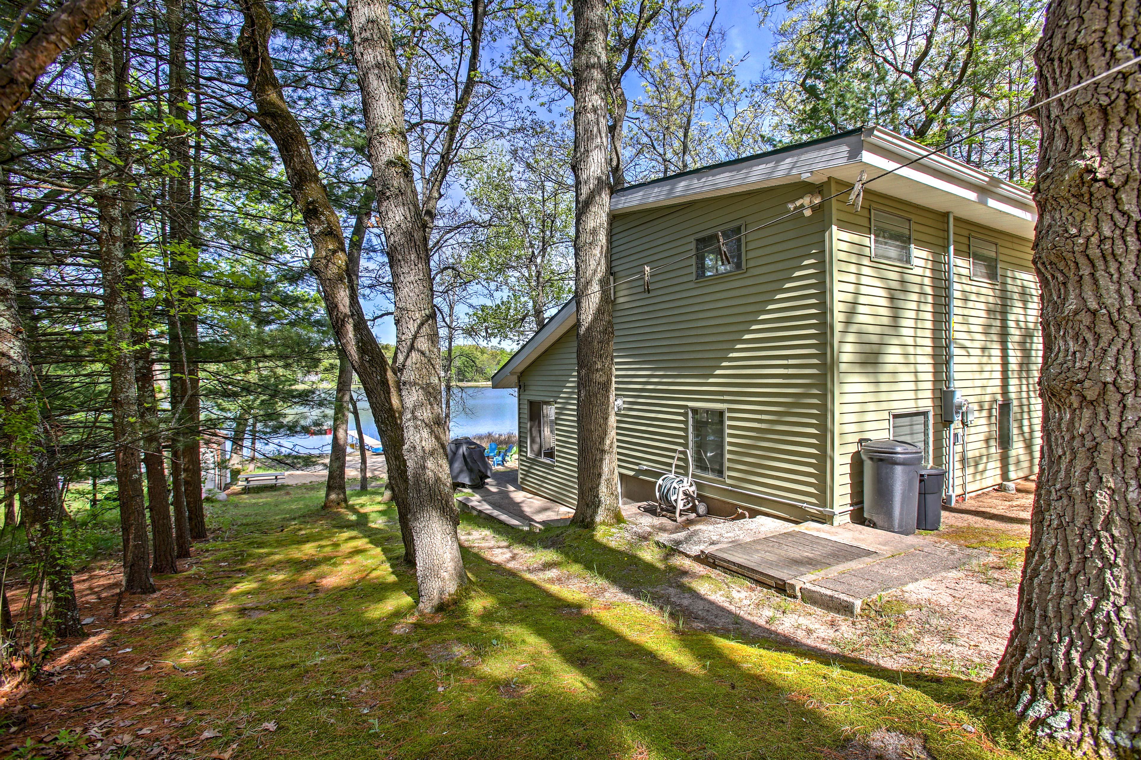 It's nestled within the beautiful Huron-Manistee National Forest!