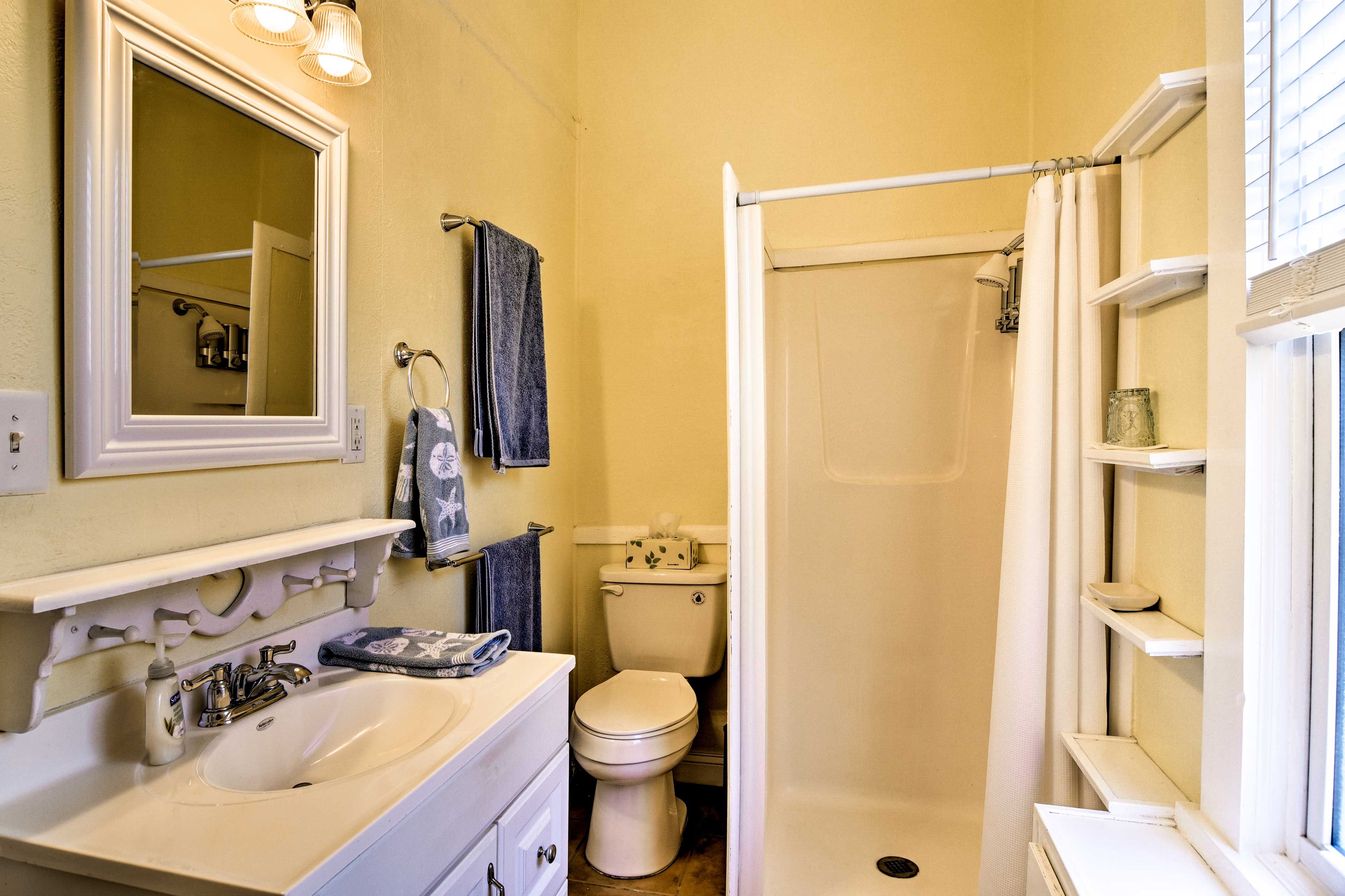 Freshen up in the walk-in shower of the first bathroom.