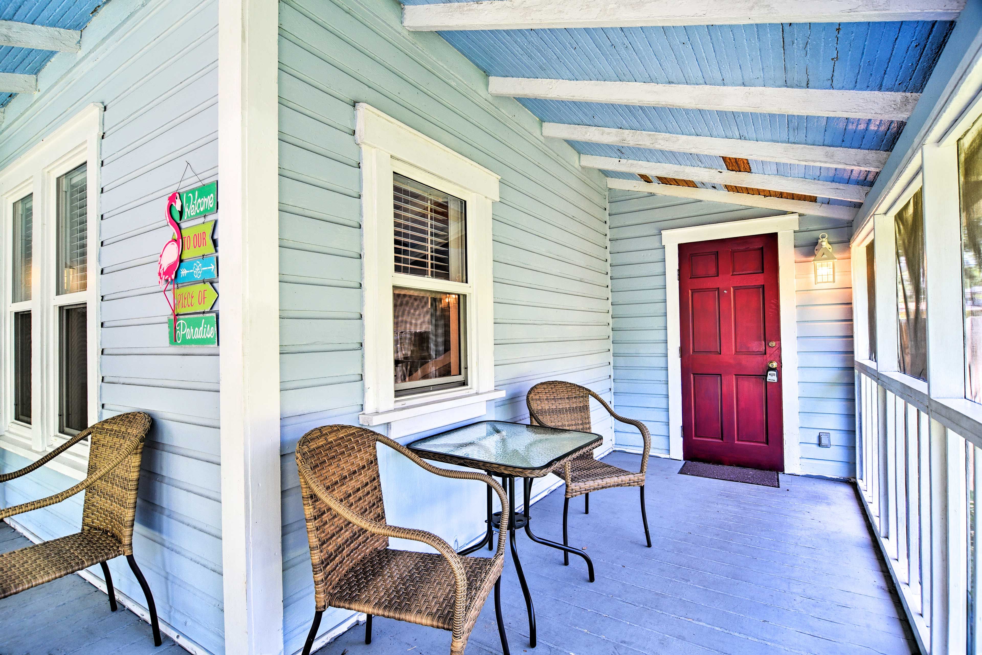 Enjoy morning coffee from the screened-in porch.
