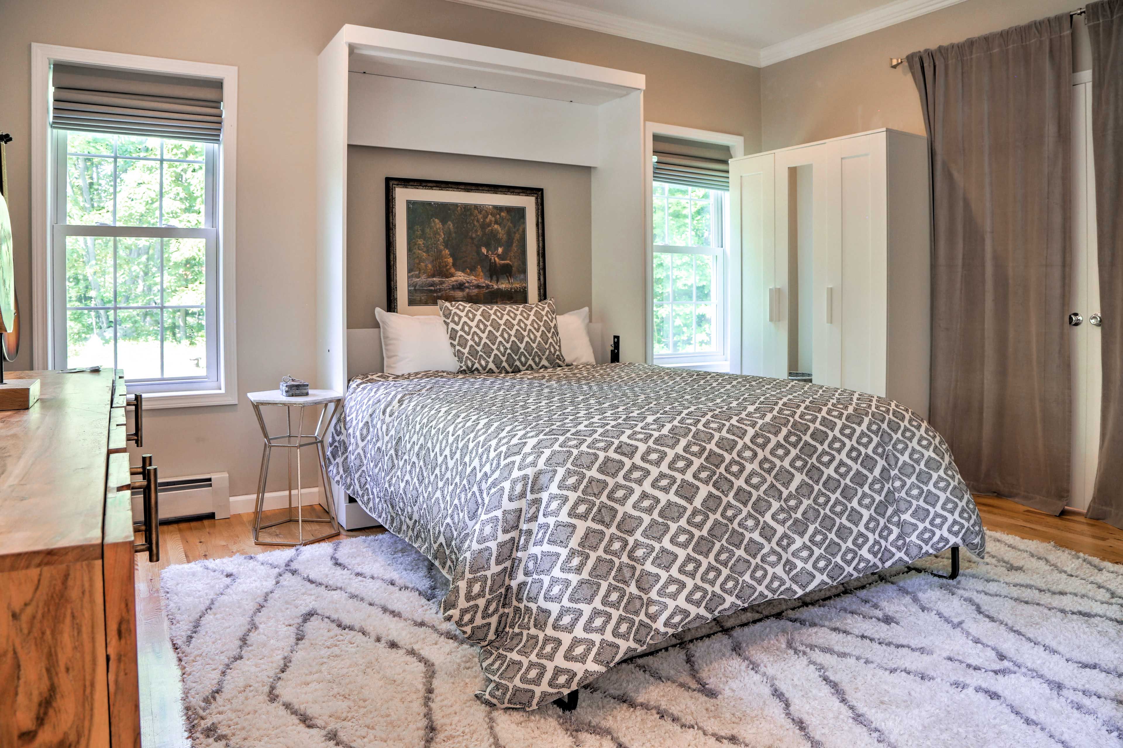 Pull down the queen Murphy bed in this room.