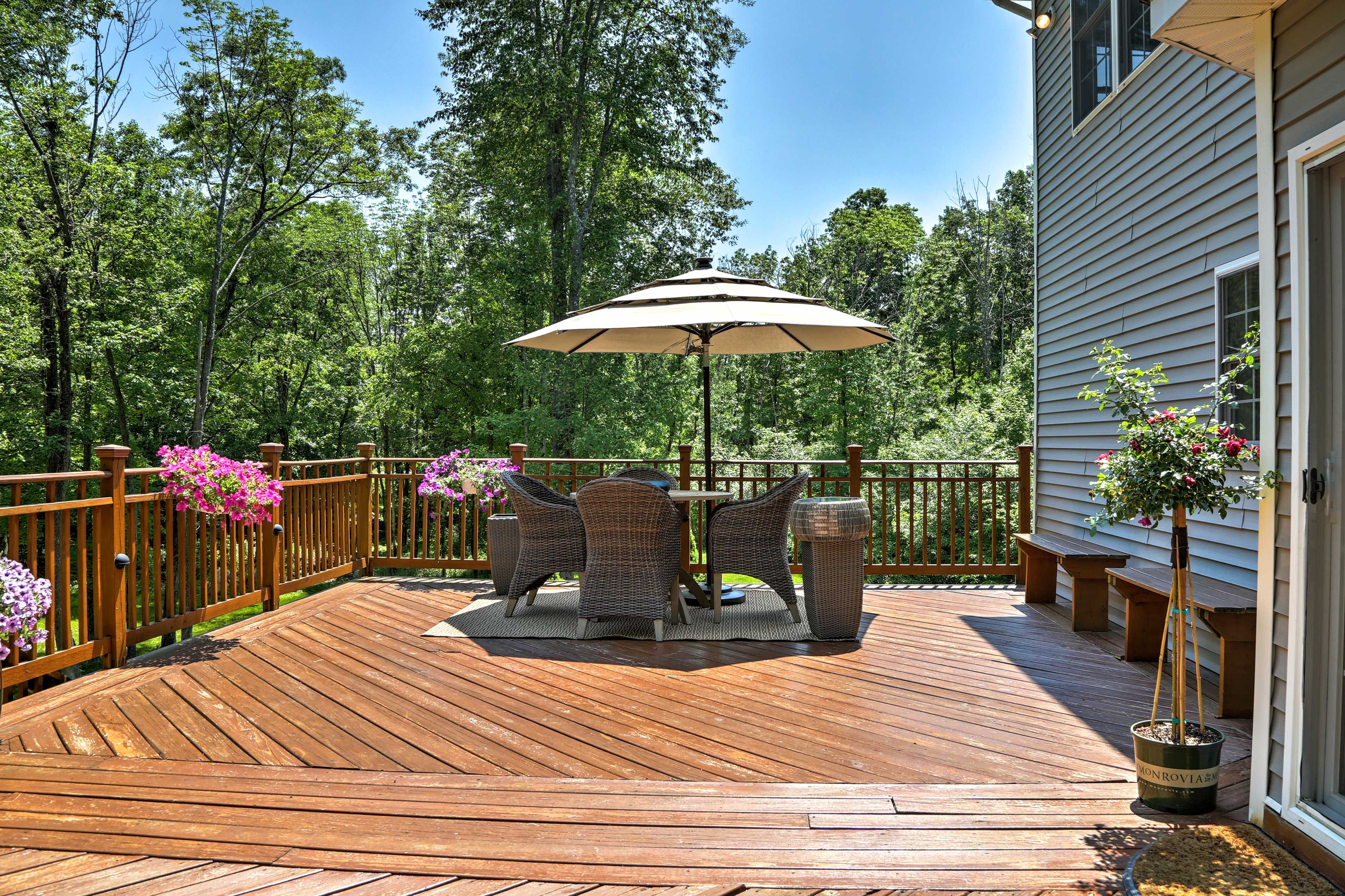 Chow down at the outdoor table in the shade of the umbrella.