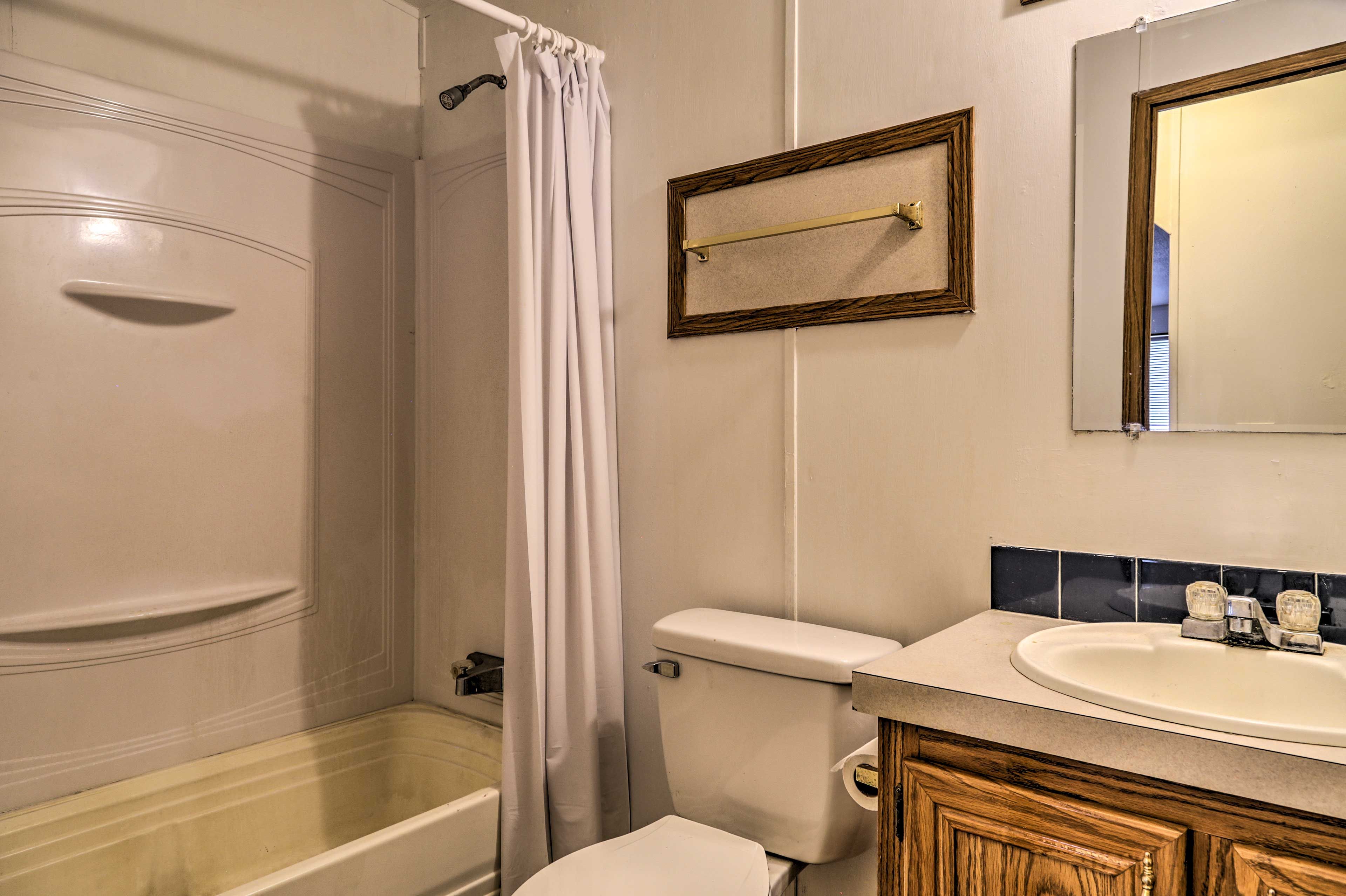 An additional full bathroom provides added privacy.