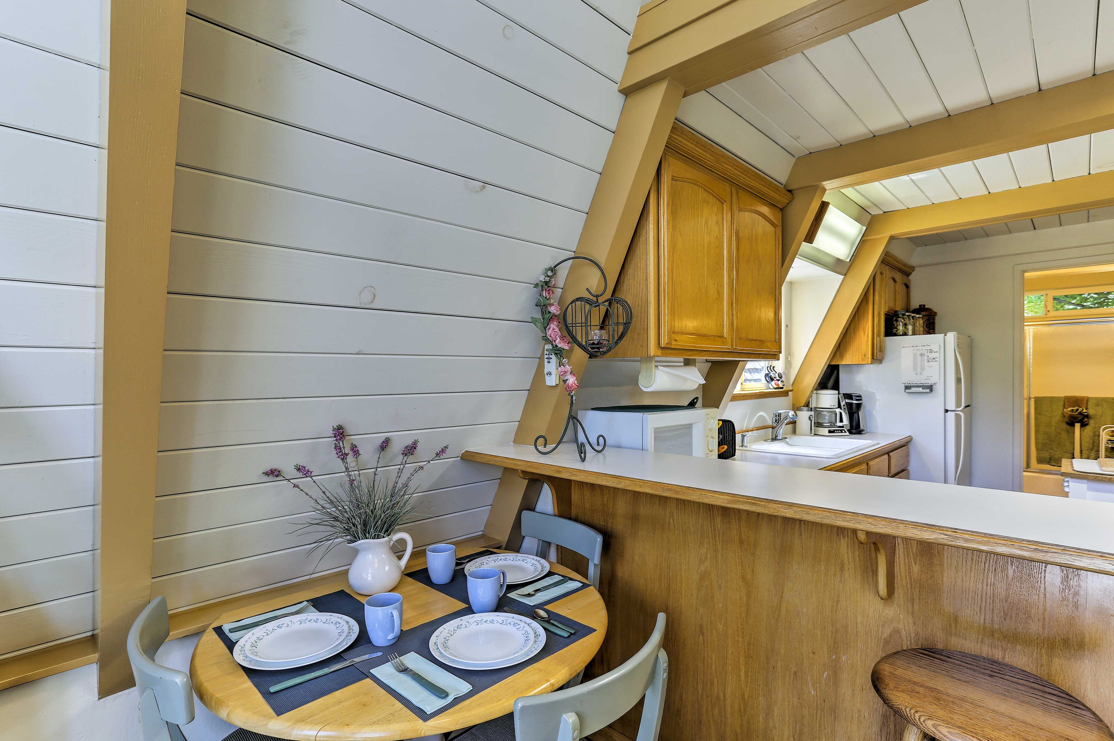 Prepare a snack and eat it at the dining table.
