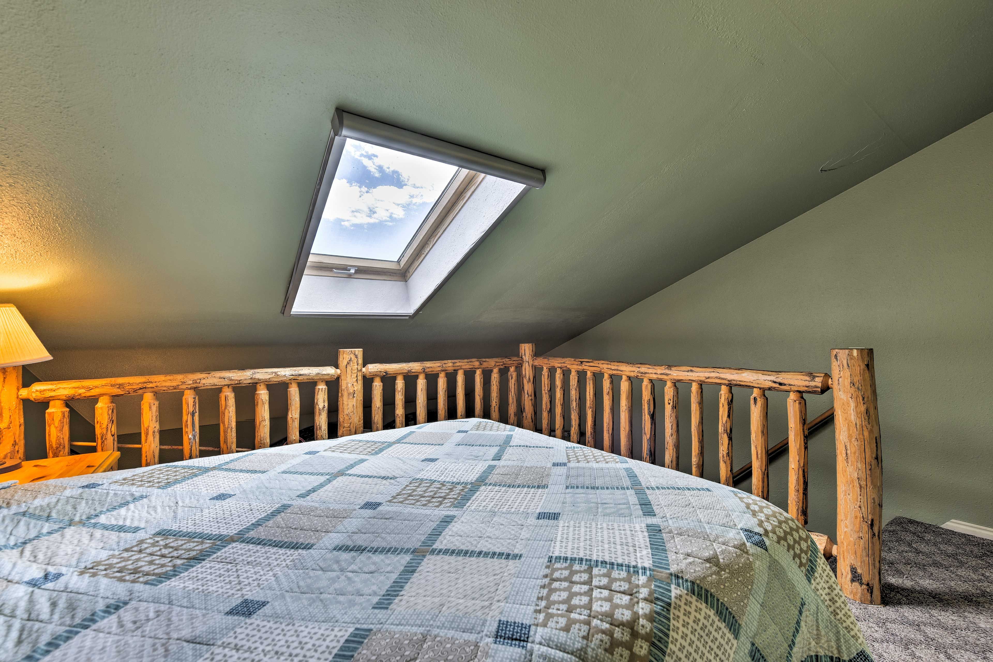 Wake to warmth and light pouring in through the skylight.