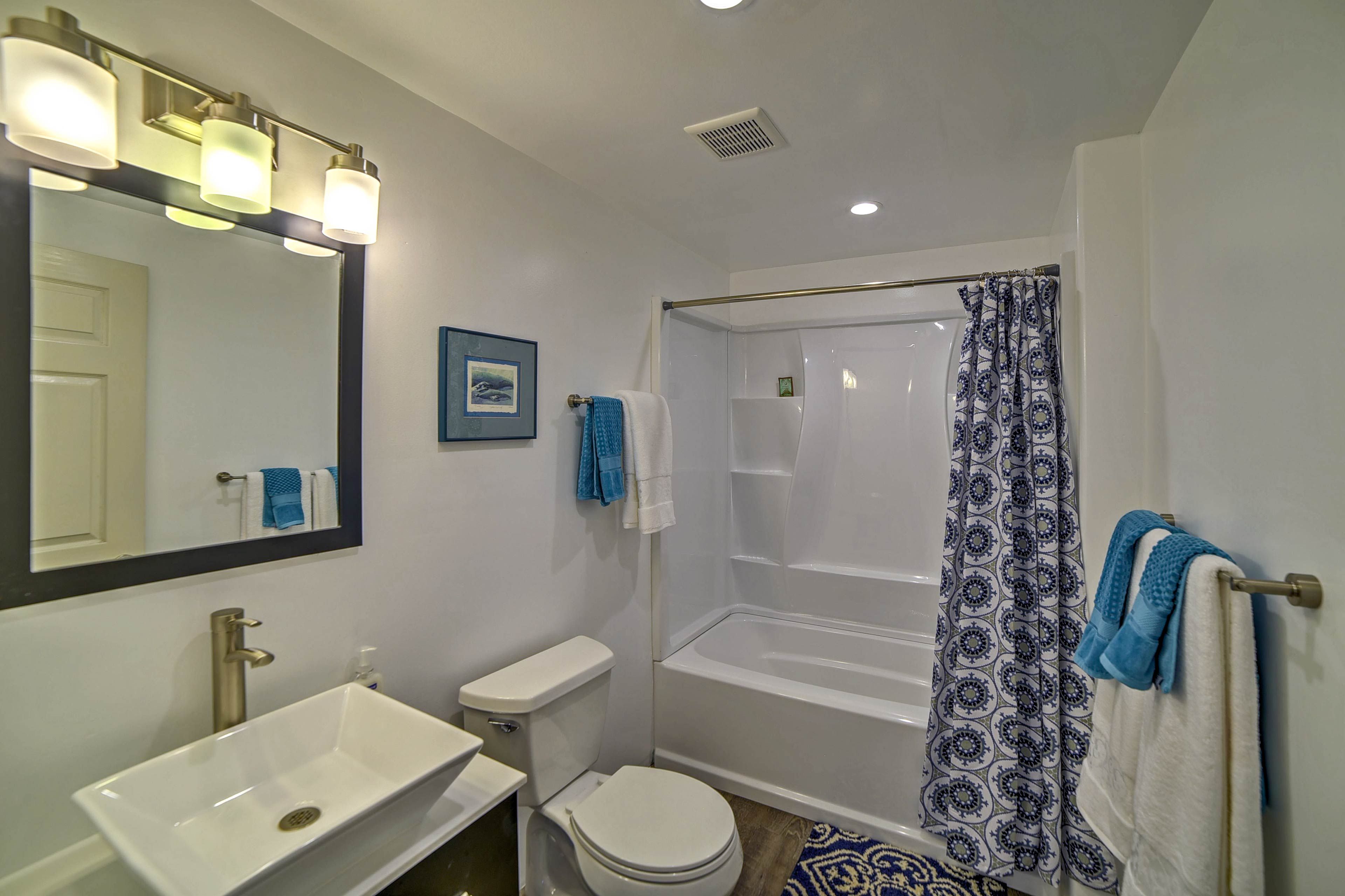 Rinse off in the full bathroom after a day on the beach.