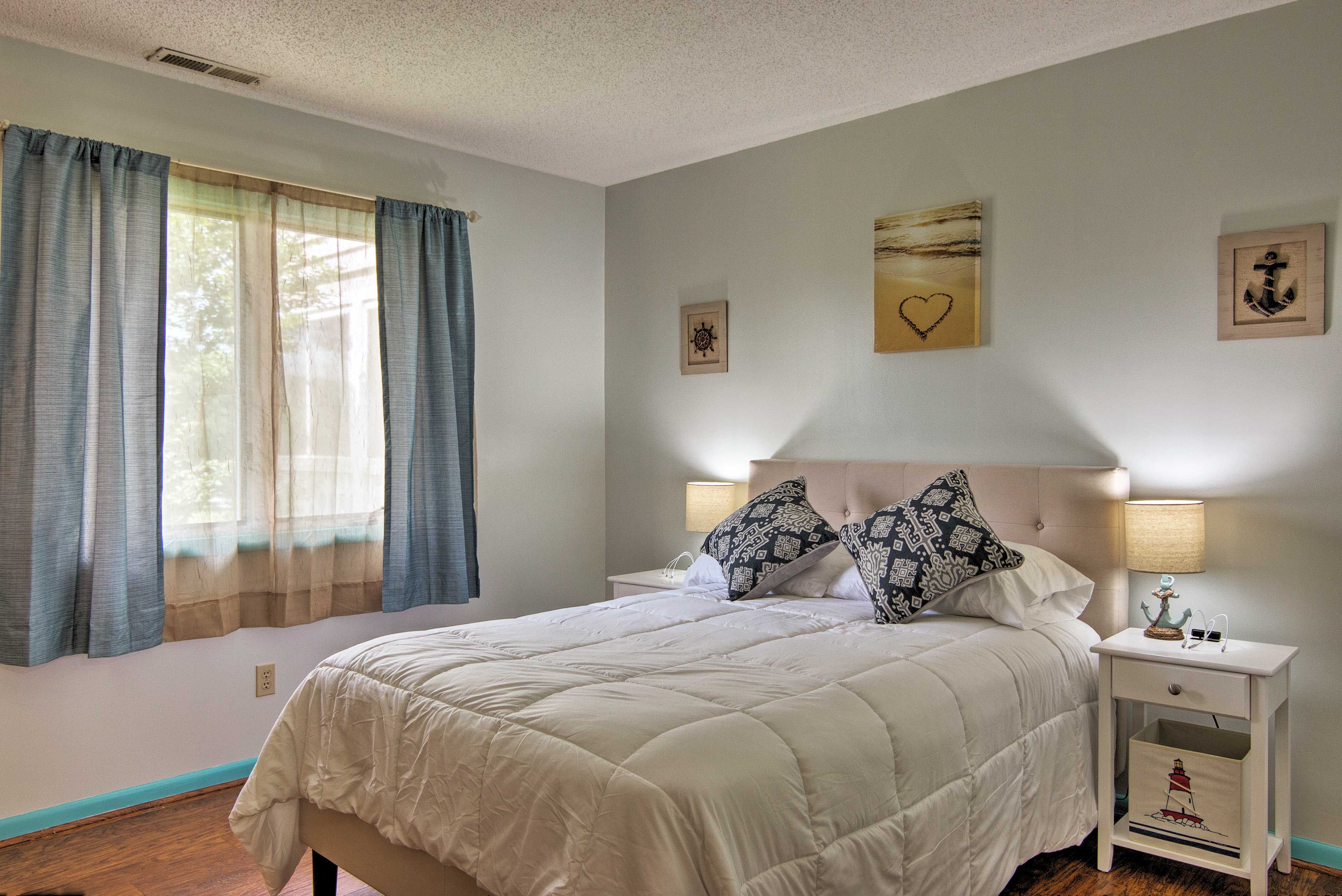 This bedroom hosts a full bed that promises restful sleep every night.