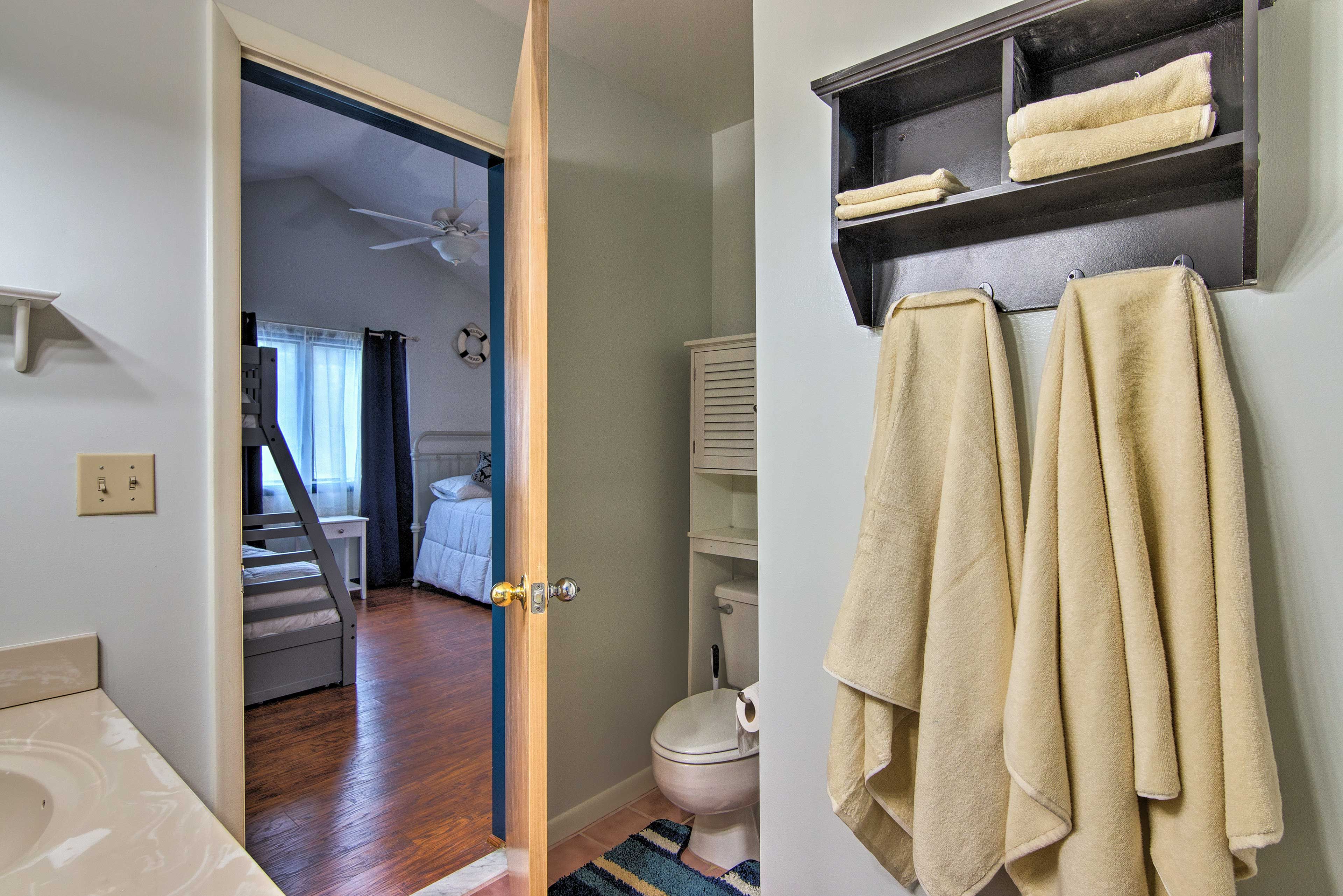 This bathroom is connected to the second bedroom.