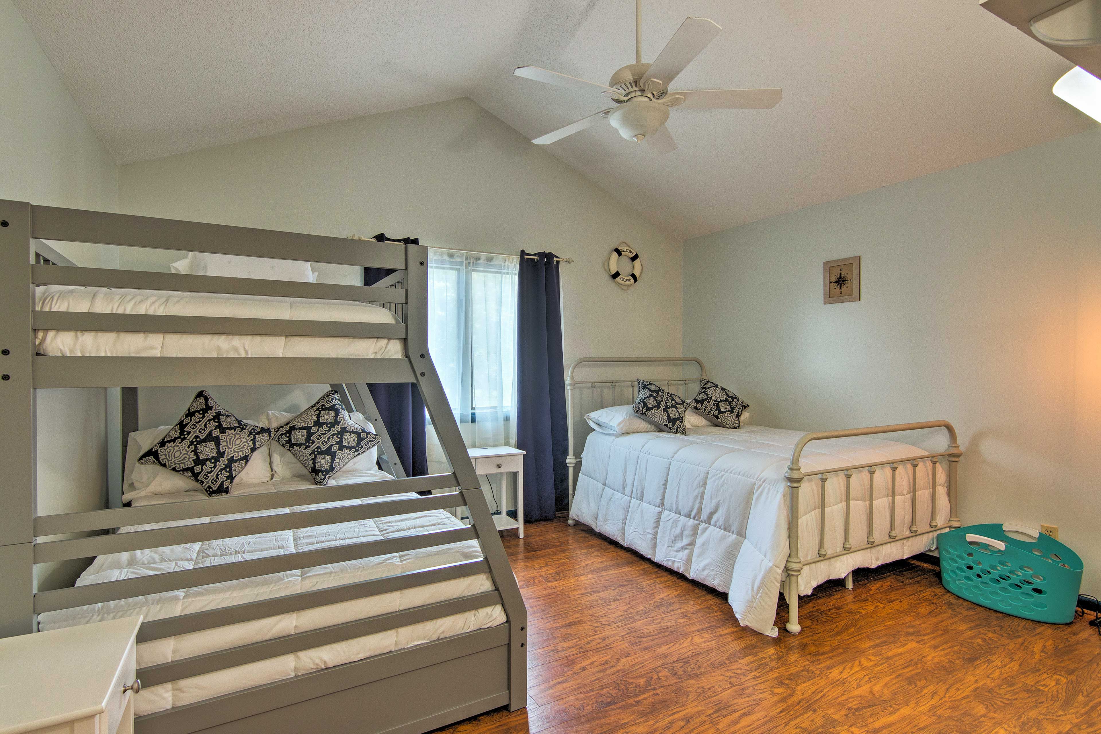 The second bedroom features a full bed and twin/full bunk bed.