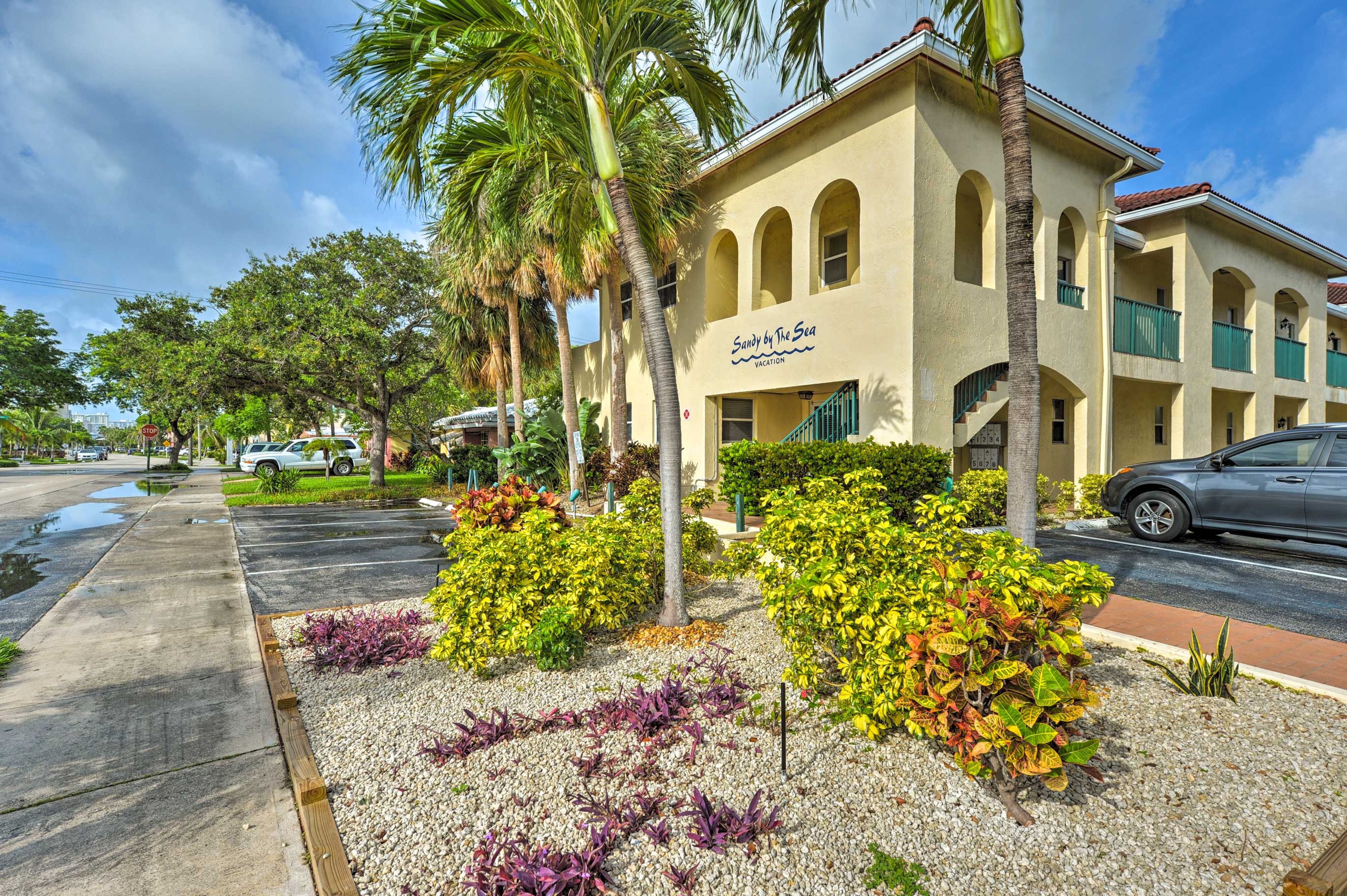 Condo Exterior | Open Lot Parking