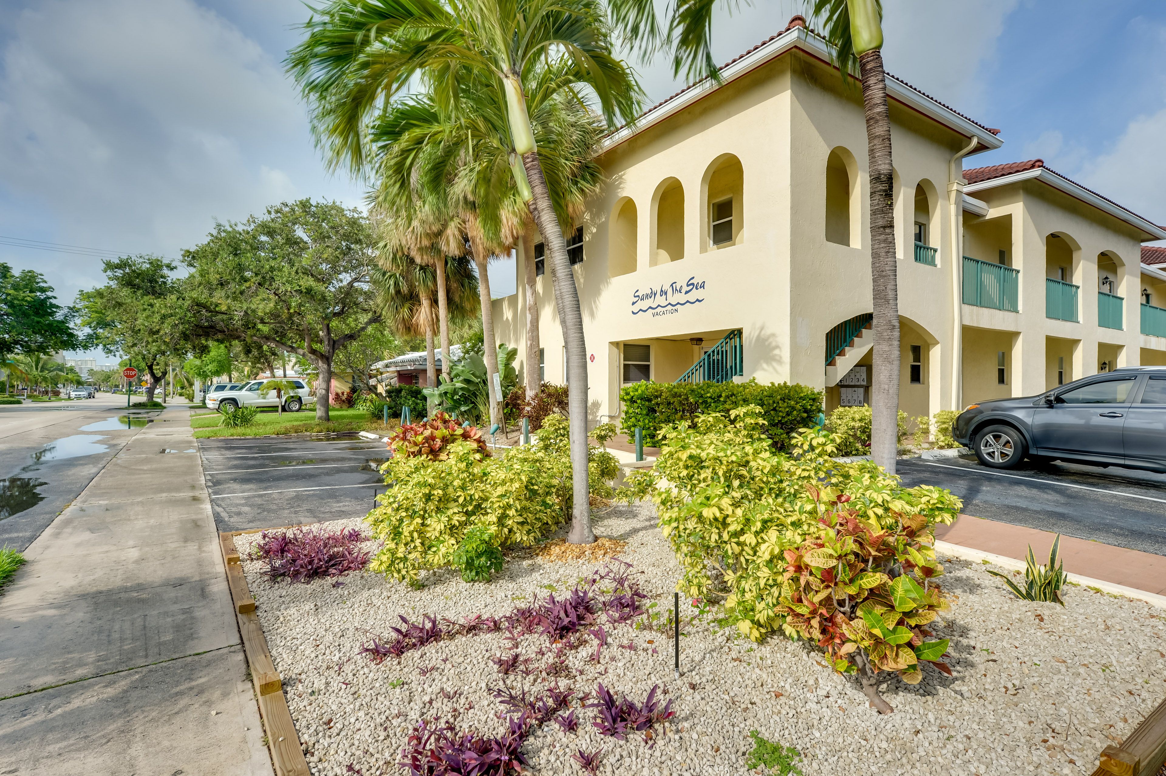 Condo Exterior | Open Lot Parking