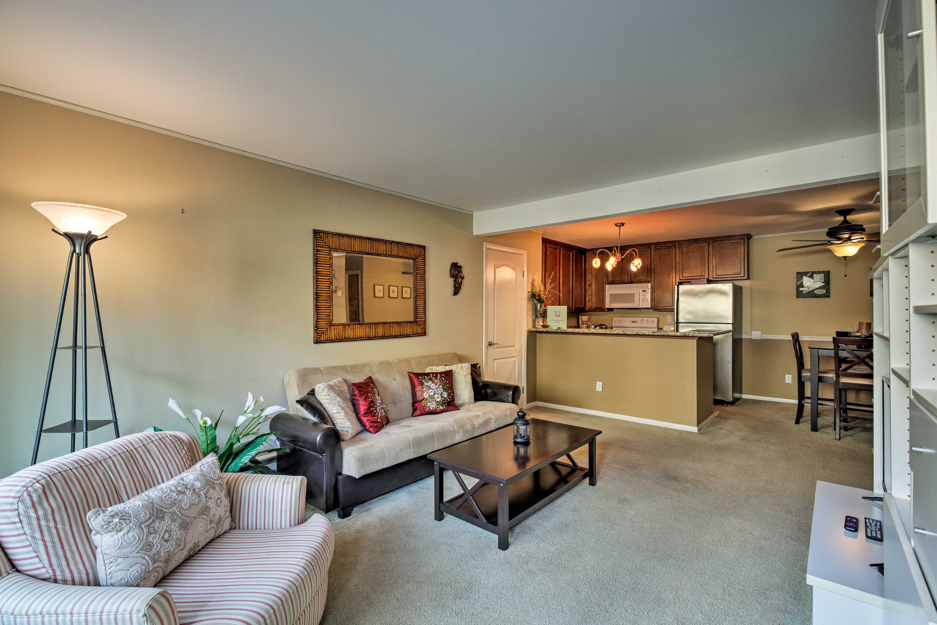 The living room couch doubles as a futon for friends.