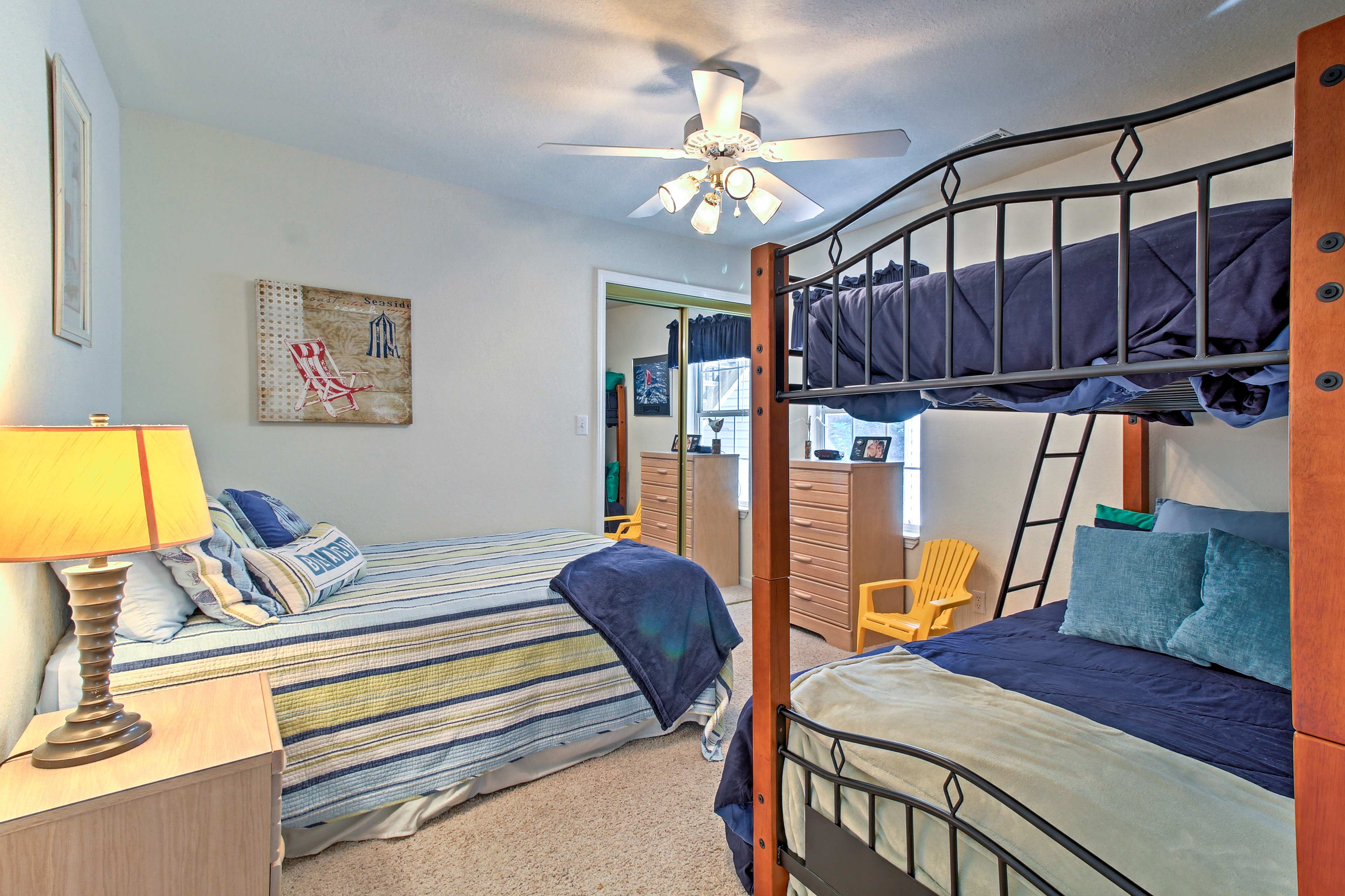 The 2nd bedroom features 3 full-sized beds.