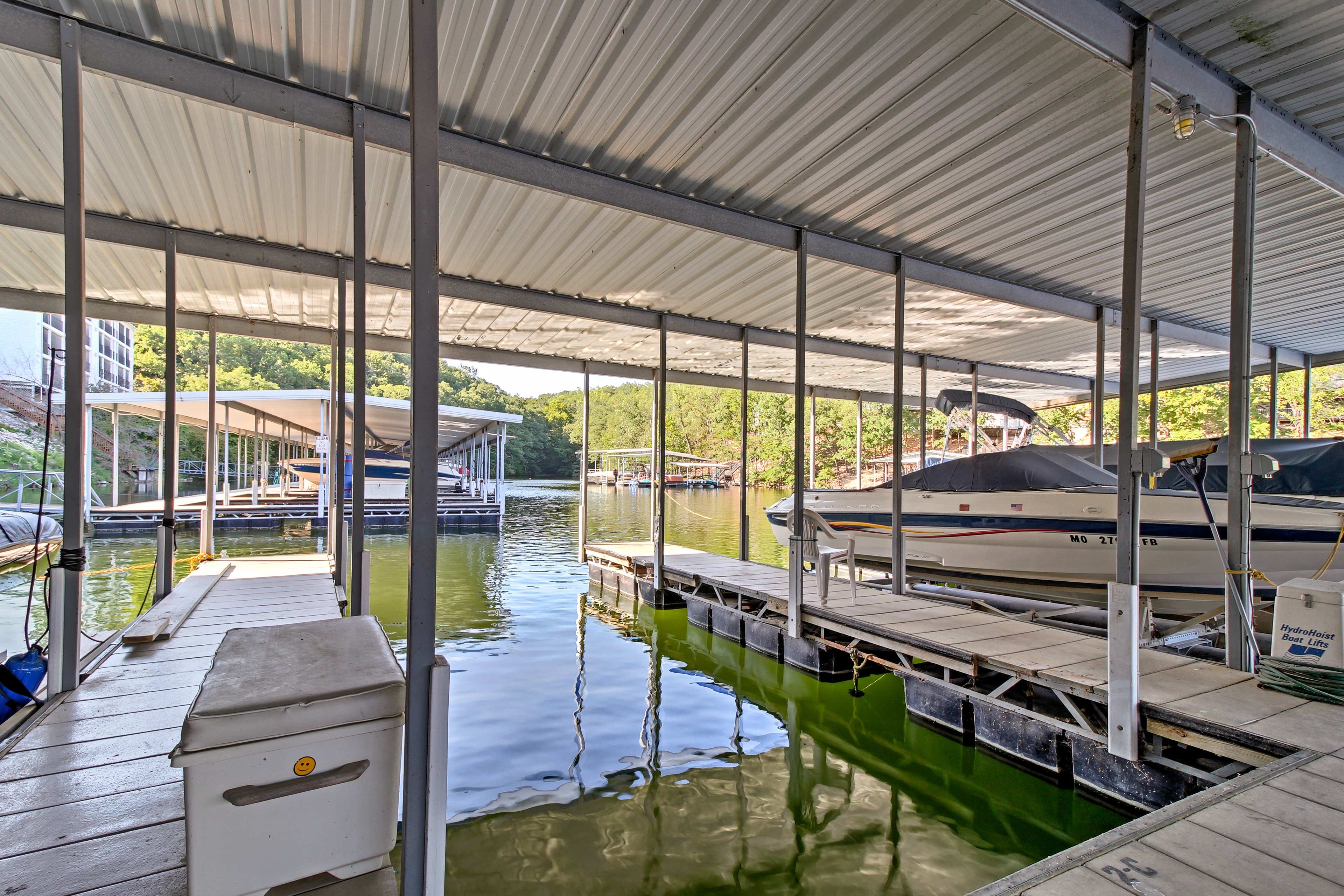 The boat slip is shared with another unit.