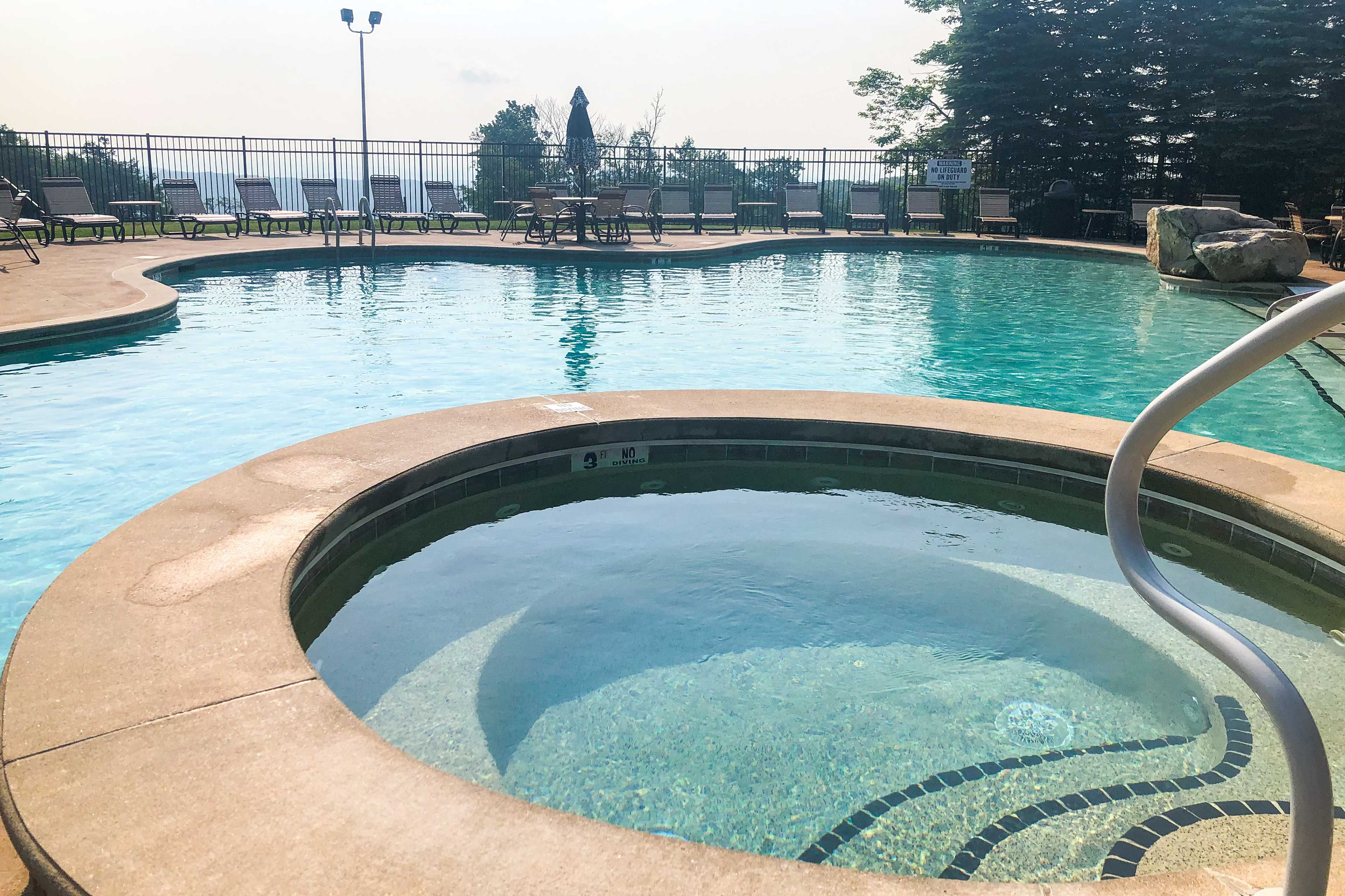 Community Amenities | Seasonal Hot Tub & Outdoor Pool (Late May-Mid September)