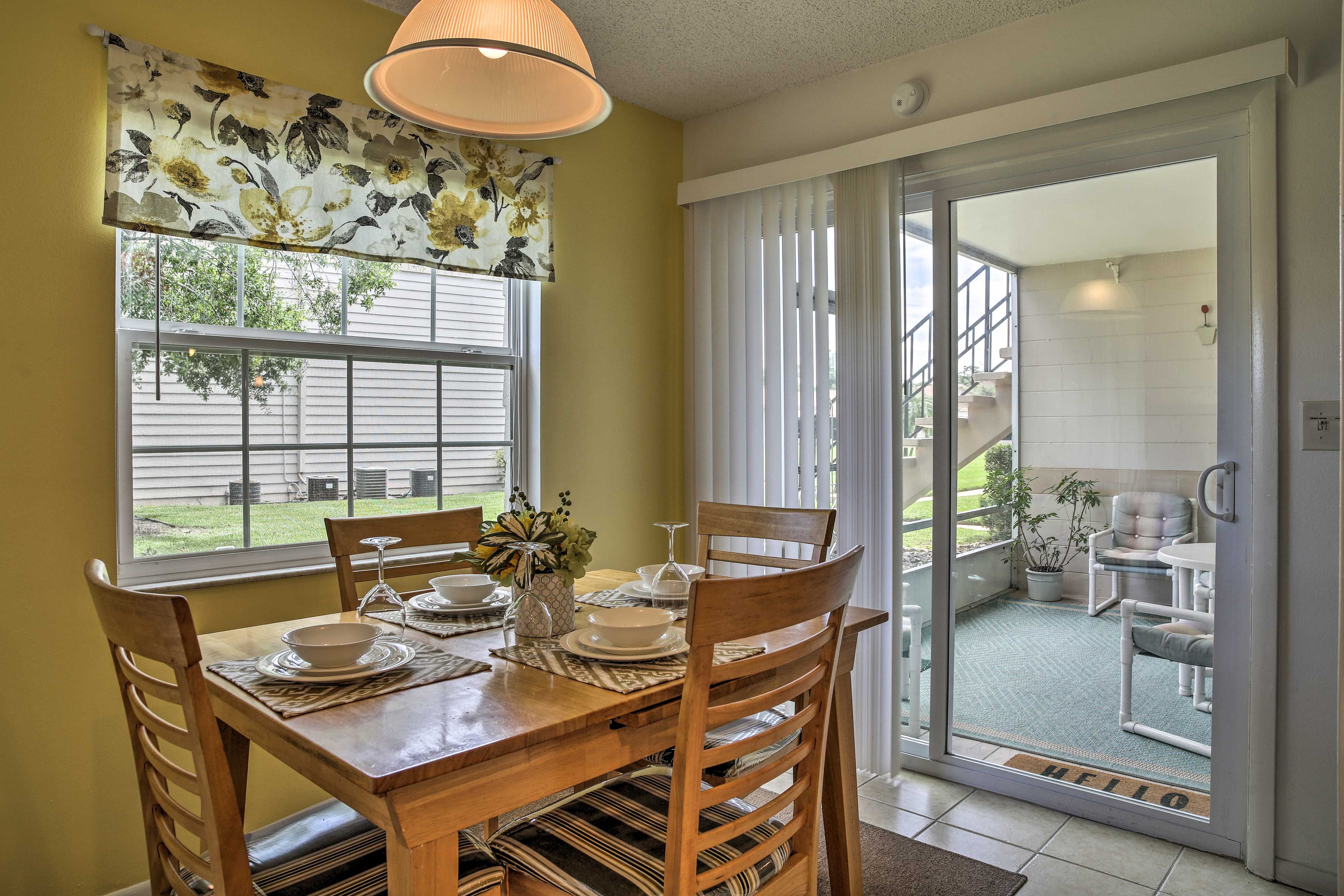 Open up the sliding glass doors to the lanai.