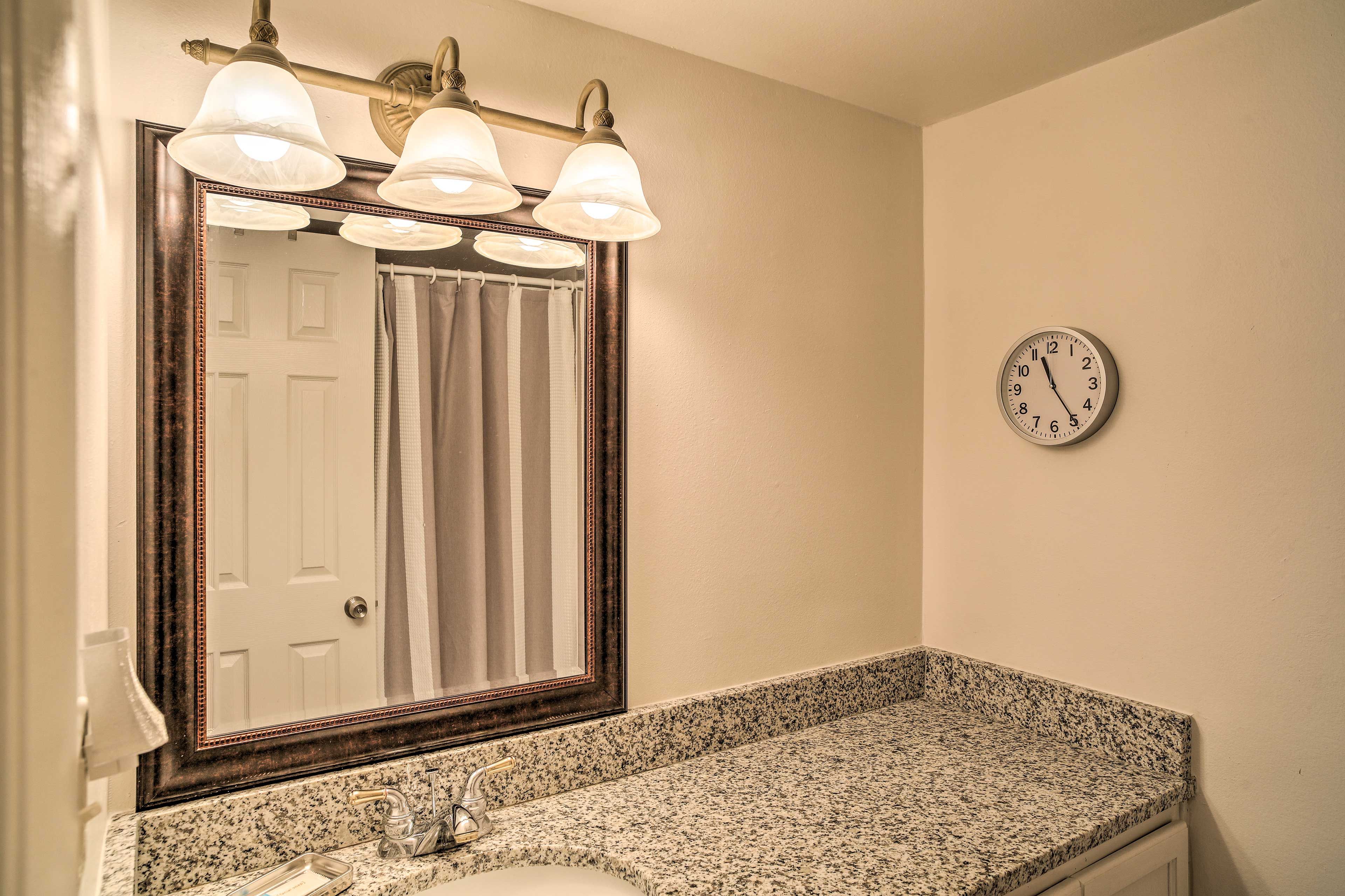 The en-suite-bathroom offers a traditional/shower tub combo.