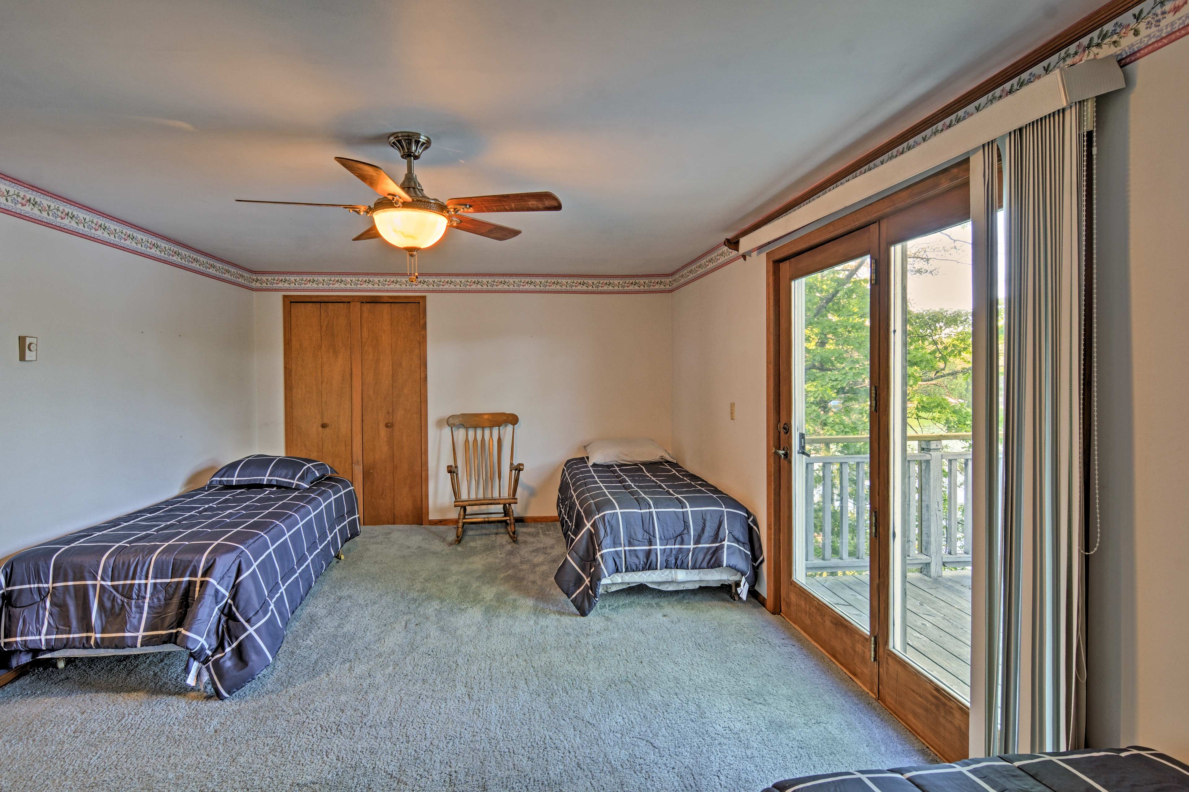 Your kids will enjoy the 4 twin beds in this bedroom.
