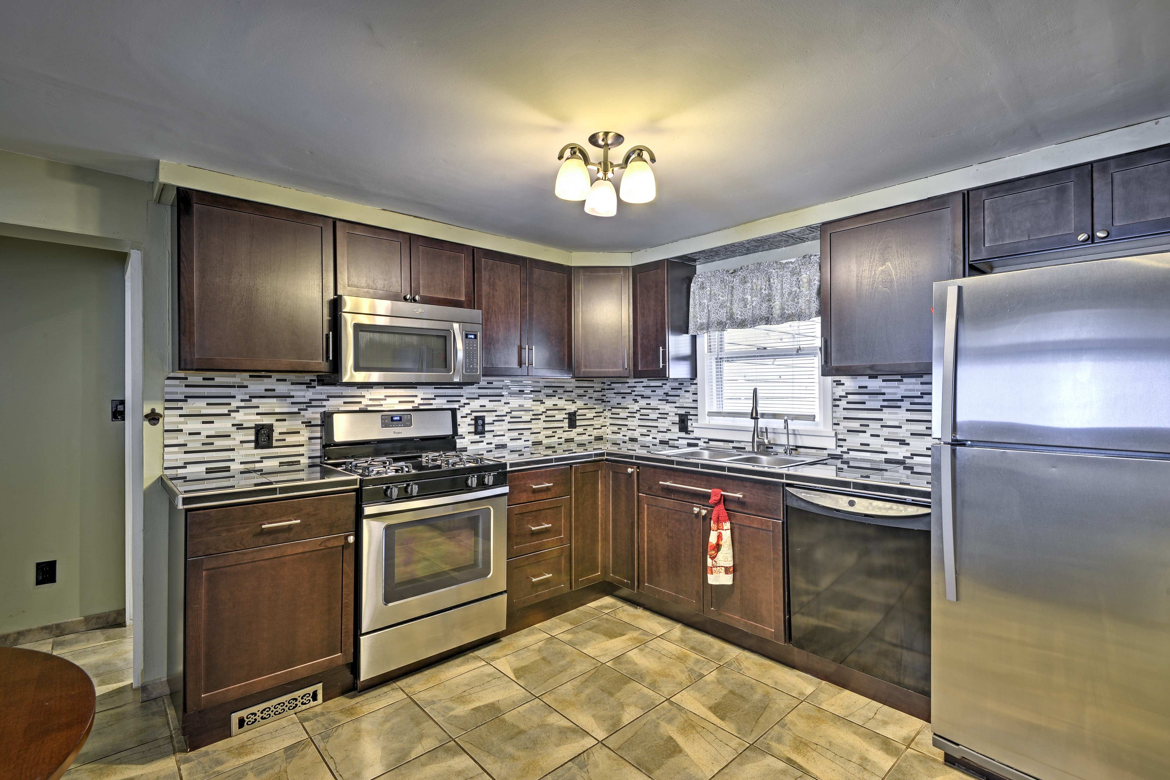 Step around the corner into the fully equipped kitchen.