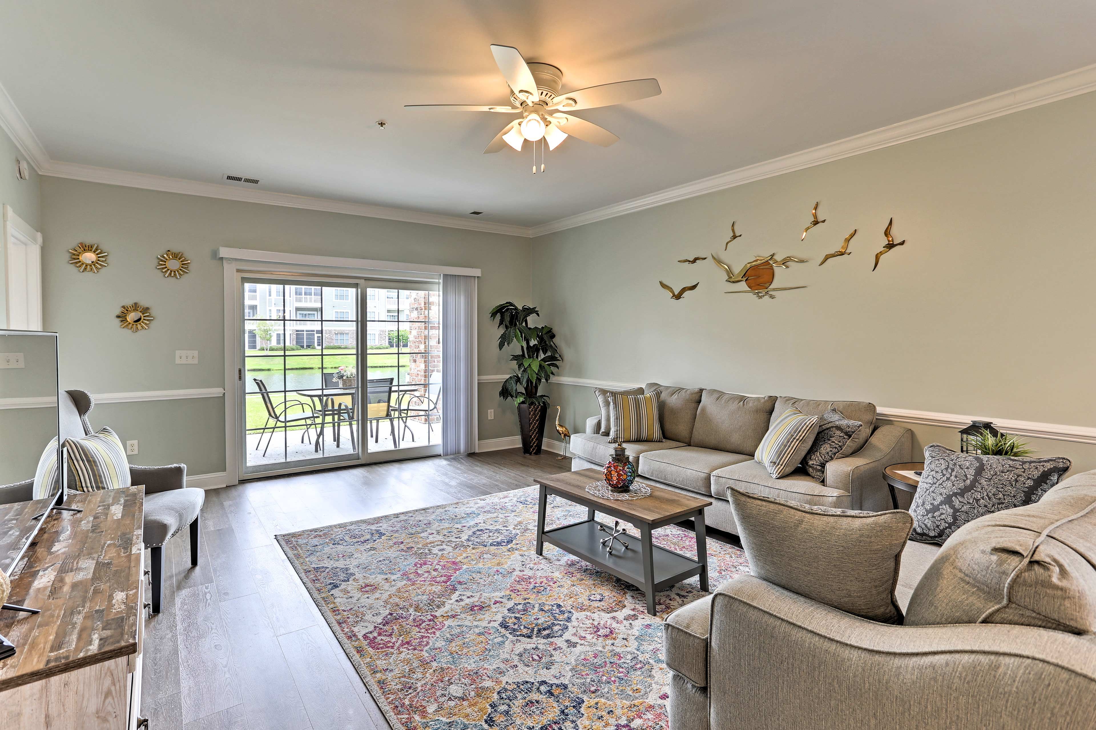 Take it easy on the plush seating in front of the flat-screen cable TV.
