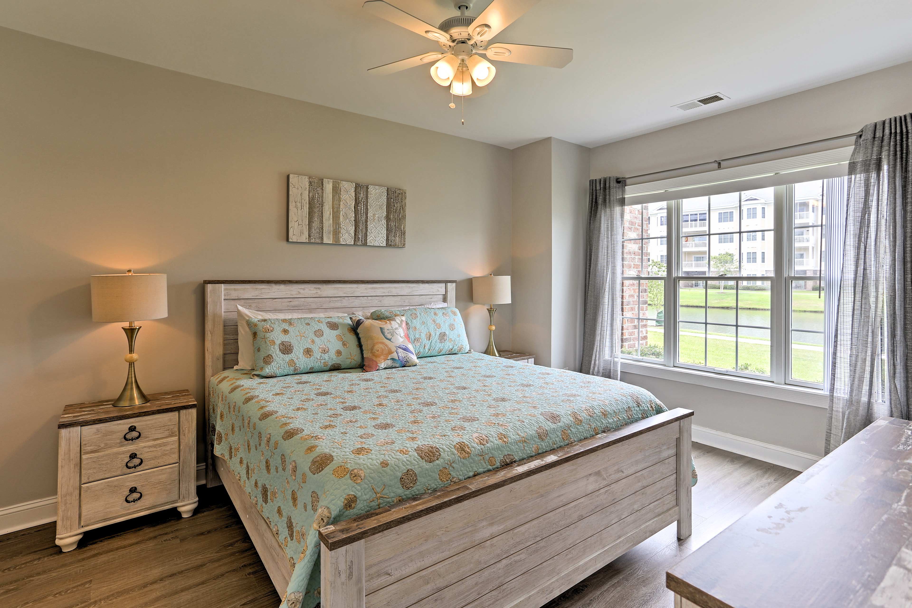 Enjoy peaceful slumber in the king bed outfitting the first bedroom.