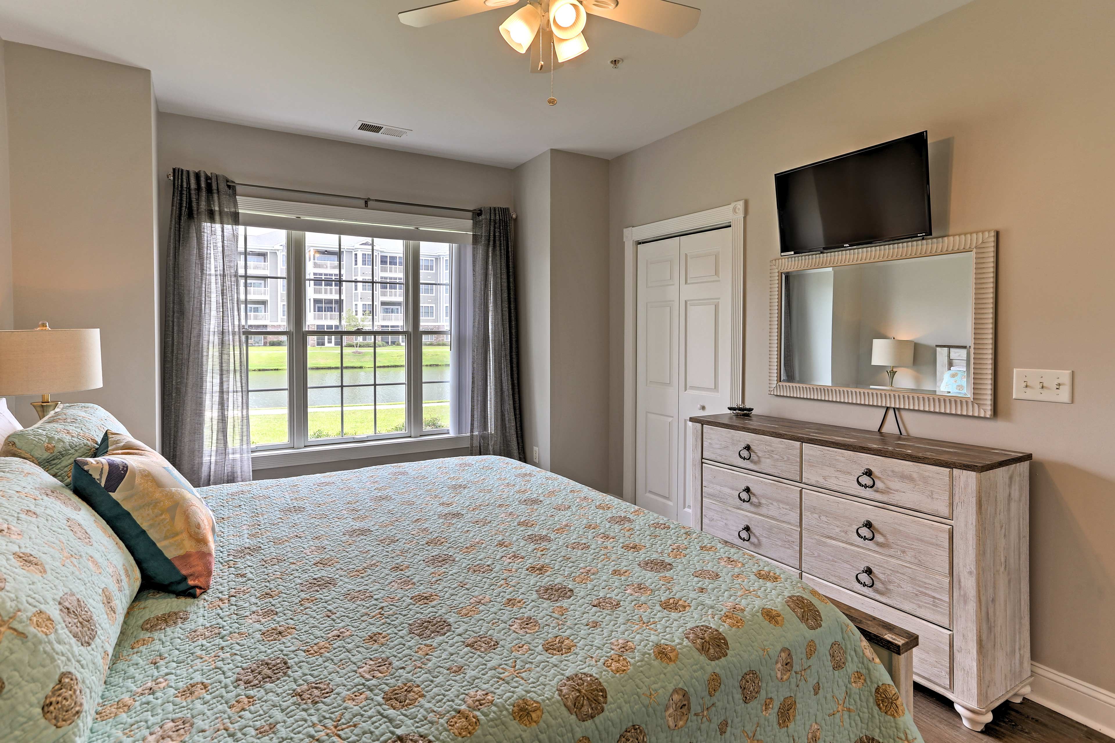 Watch a movie on the flat-screen cable TV from the comfort of your bed.