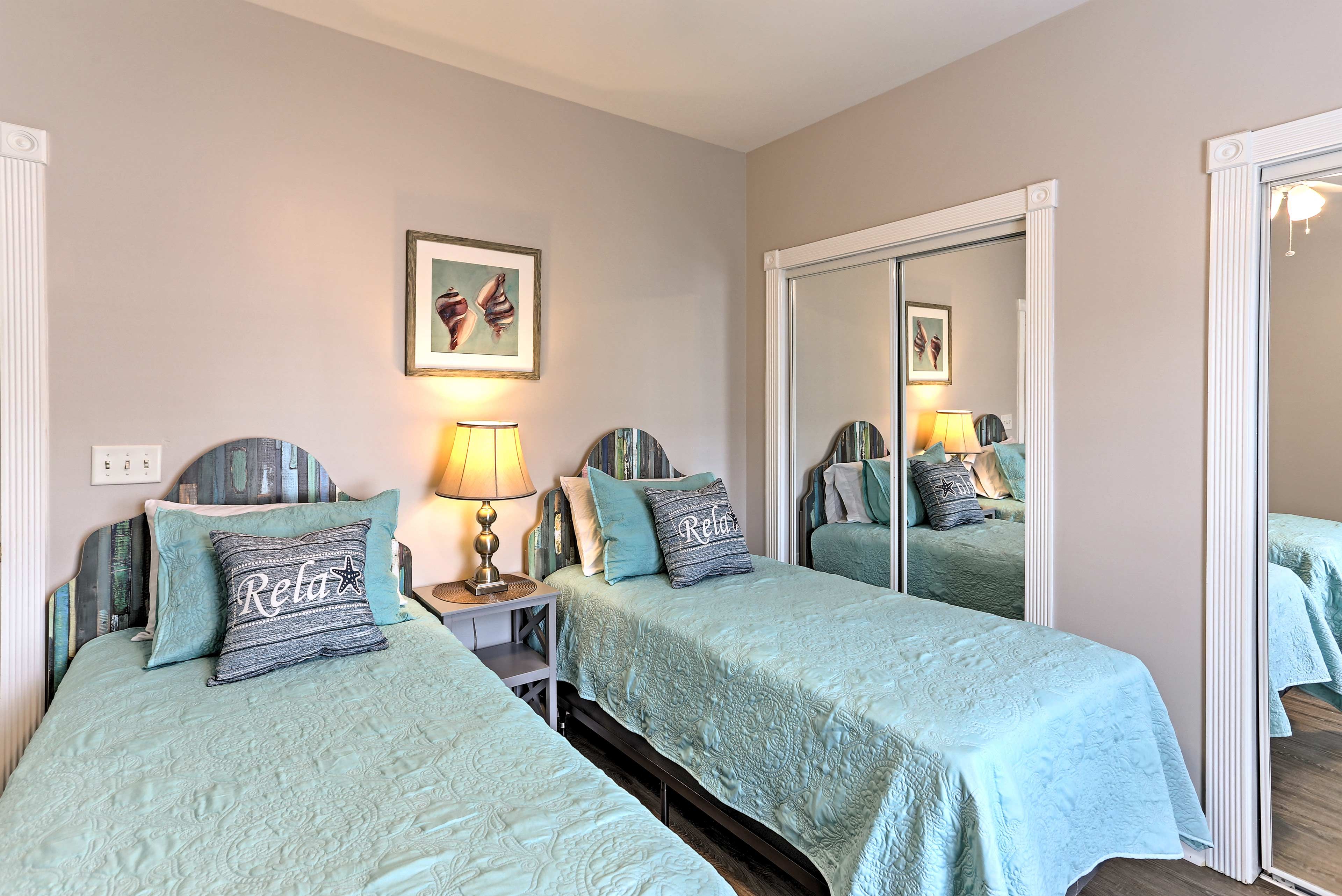The third bedroom offers 2 twin beds and 2 full closets.