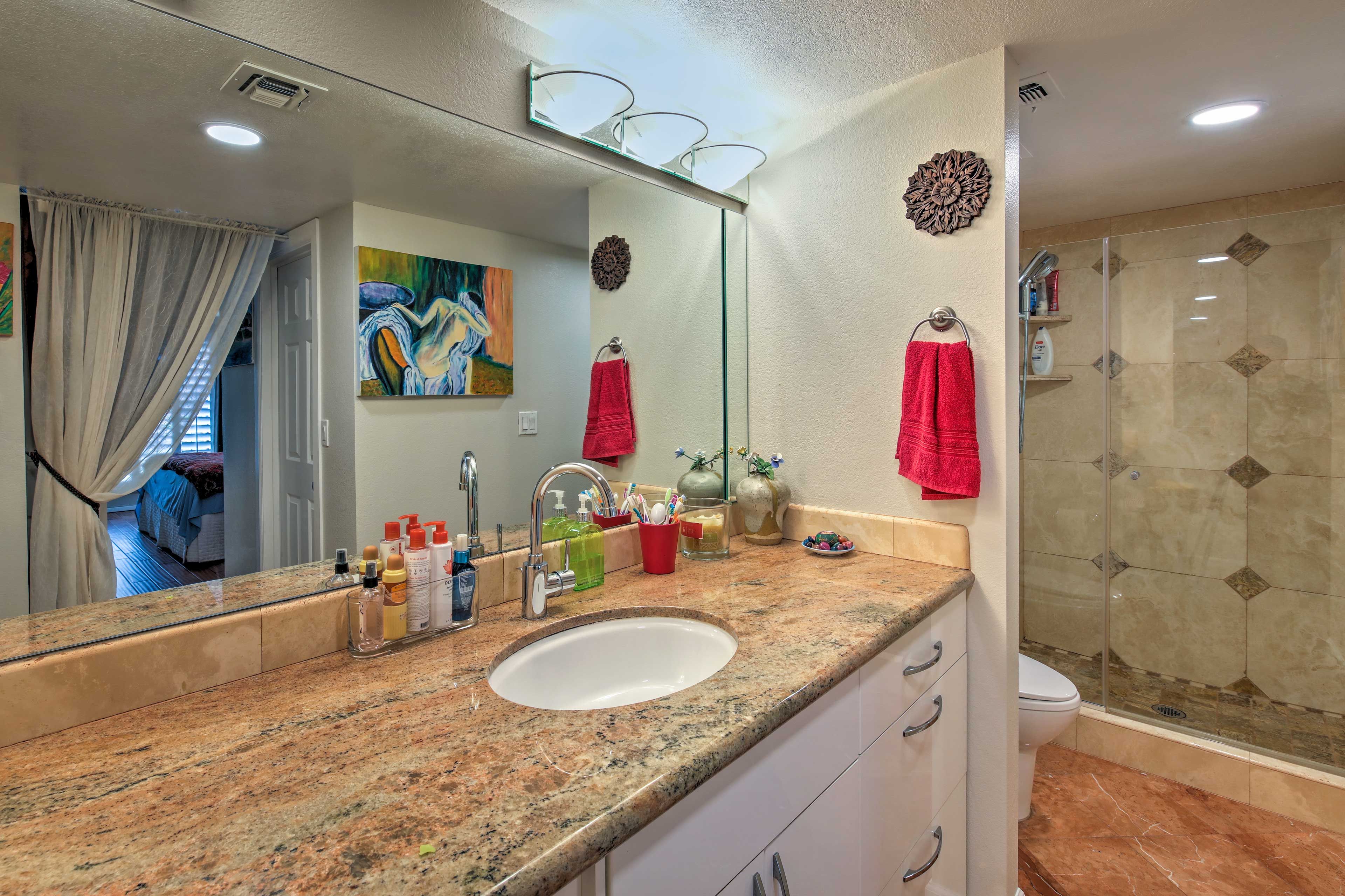 This full bathroom comes complete with double sinks.