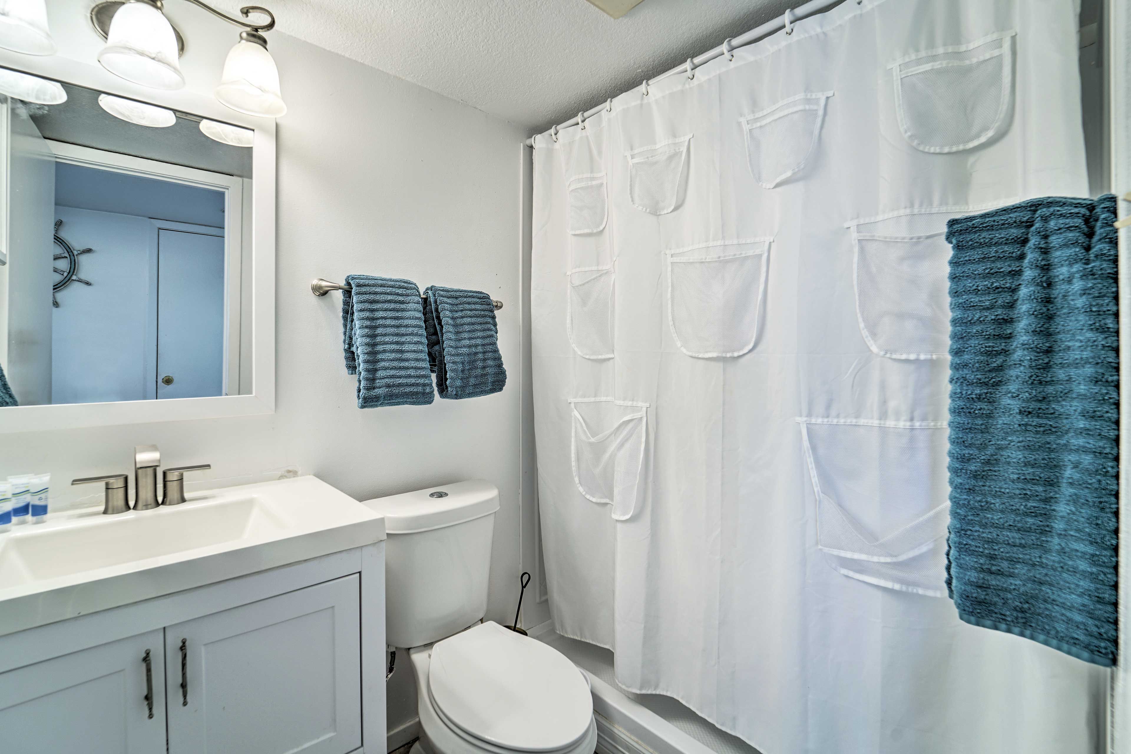 After a day on the beach, shower off in the full bathroom!