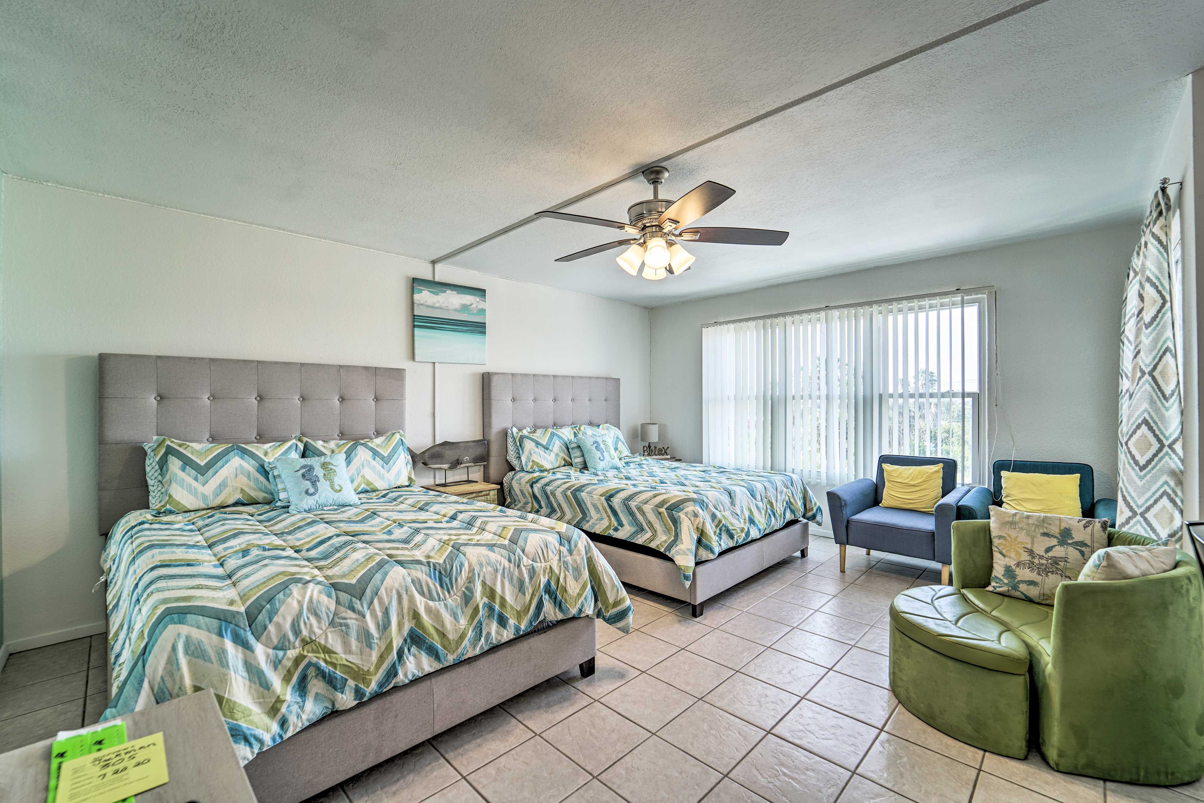 Watch the flat-screen cable TV from the comfort of the queen beds.