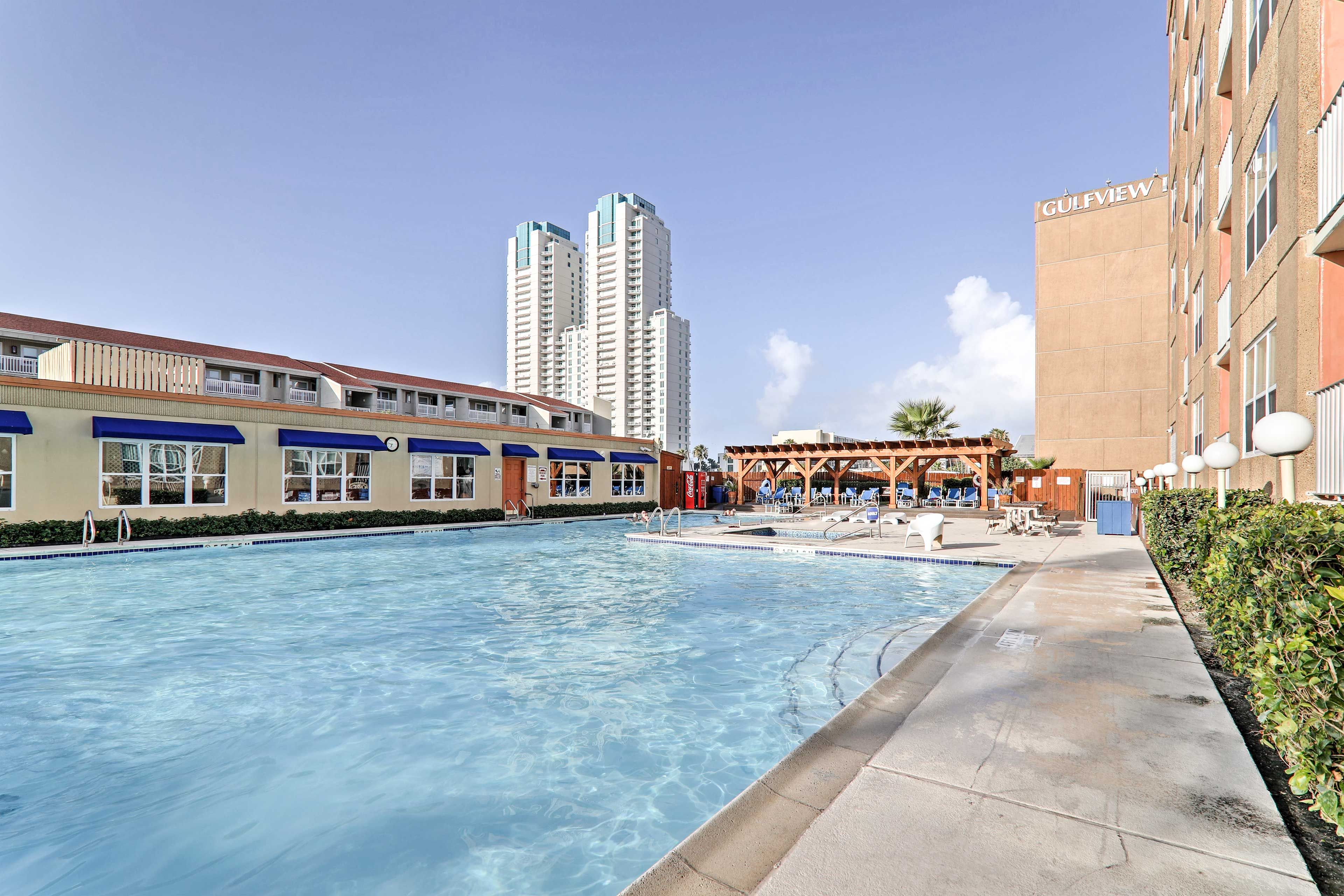Perfect your summer tan by the sparkling water of this pool!