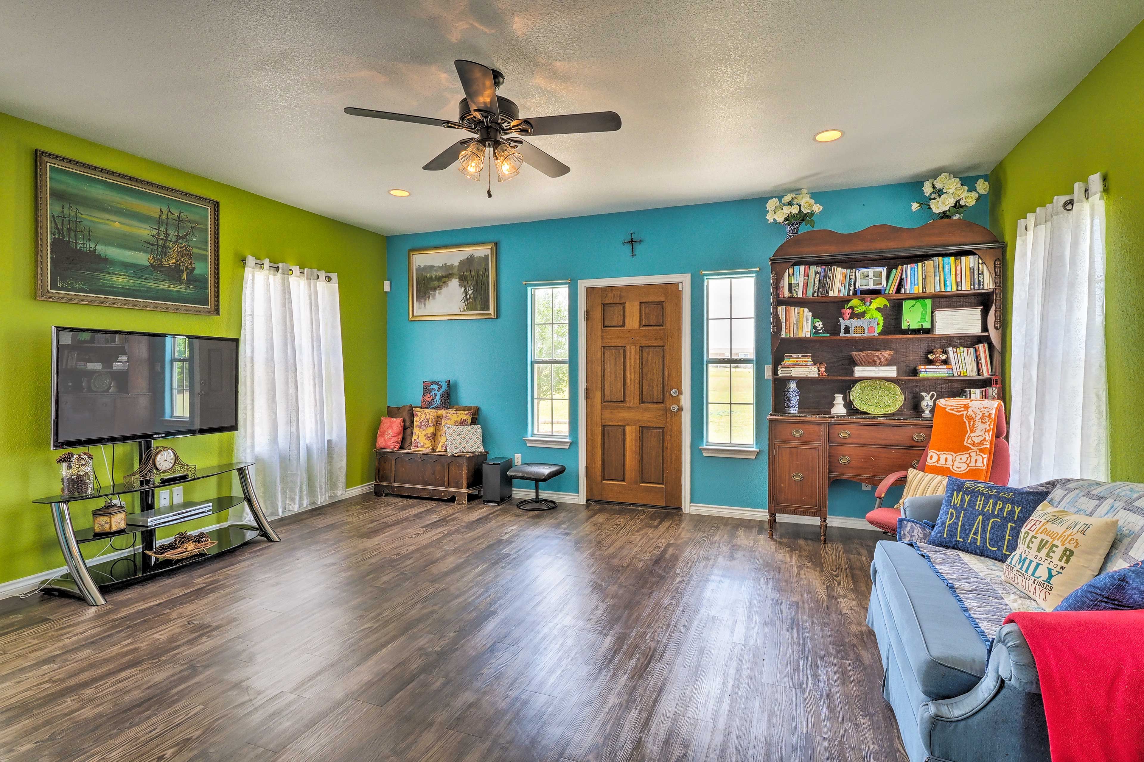 Tune into your favorite shows on the flat-screen TV in the living room.