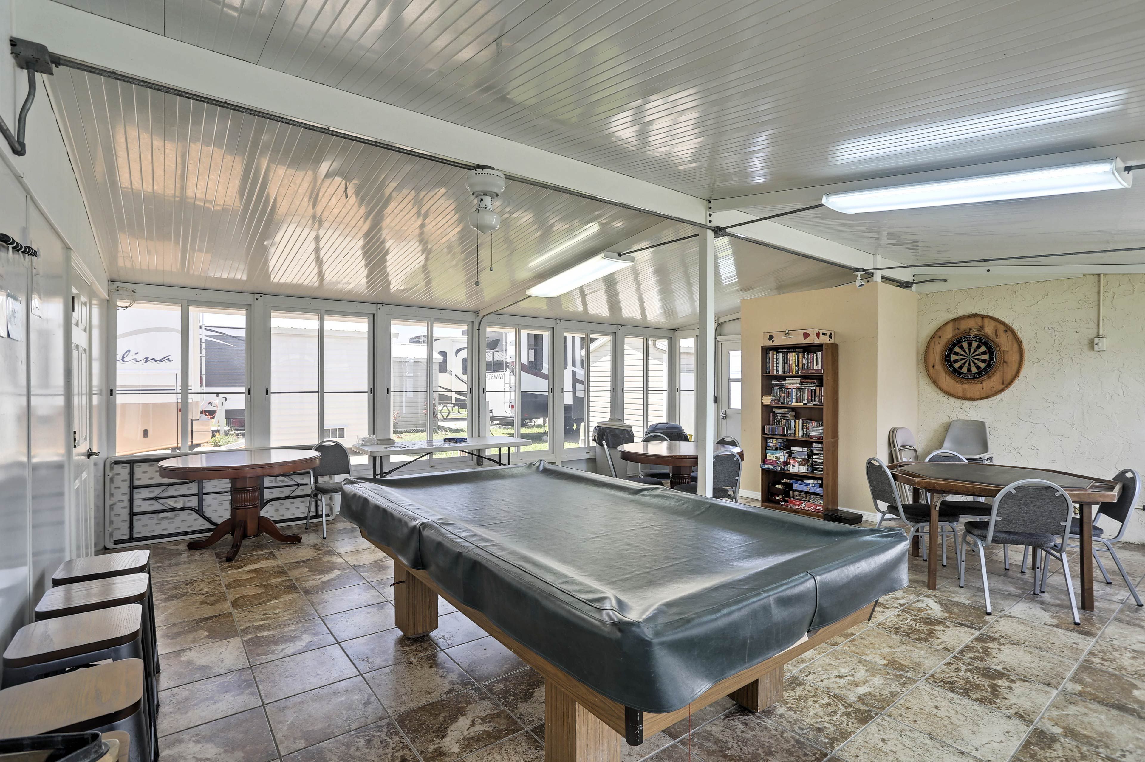Step into the game room for a billiards match!